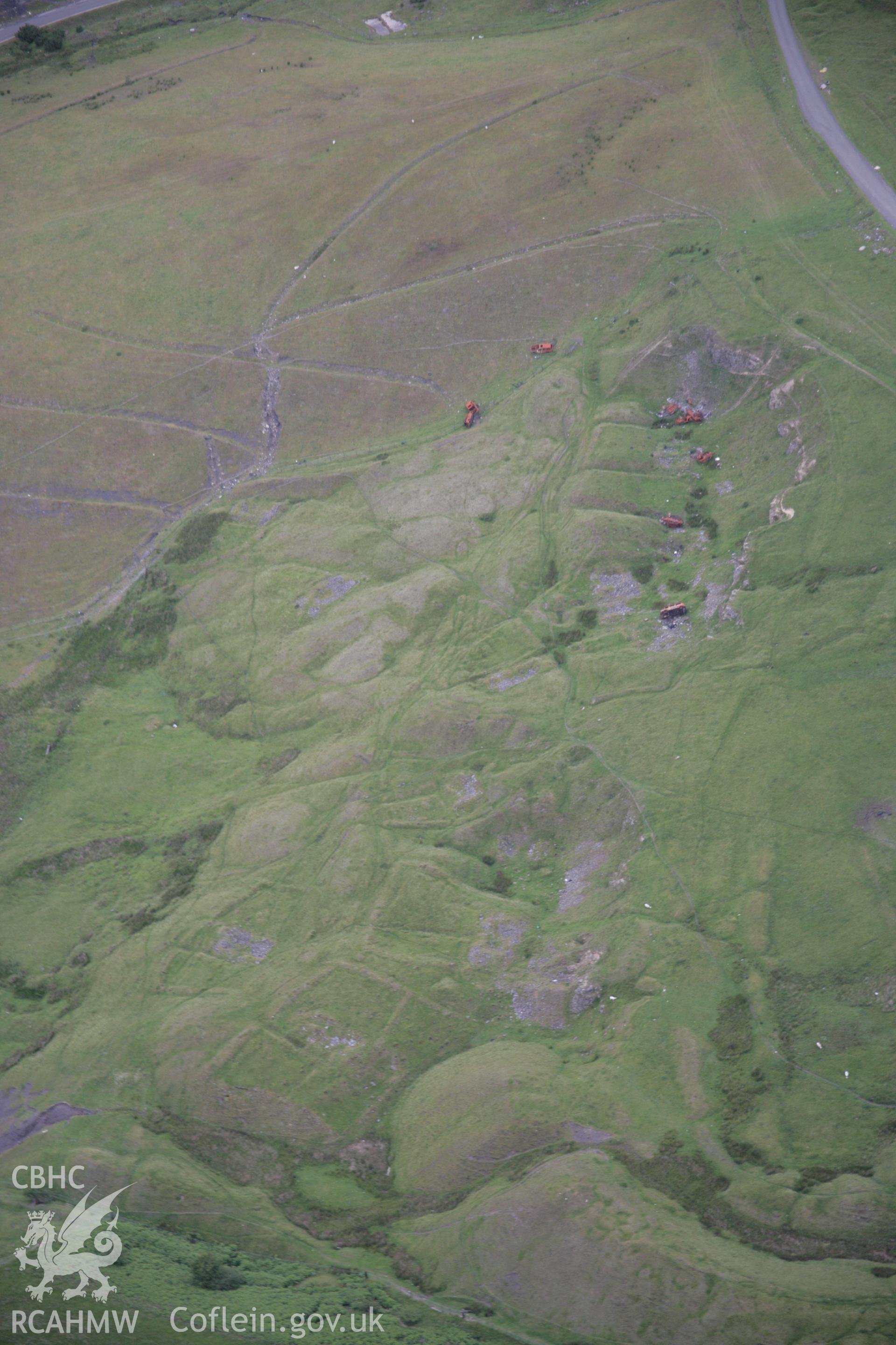 RCAHMW digital colour oblique photograph of a deserted iron mining village at Ffos-y-Fran. Taken on 07/07/2005 by T.G. Driver.