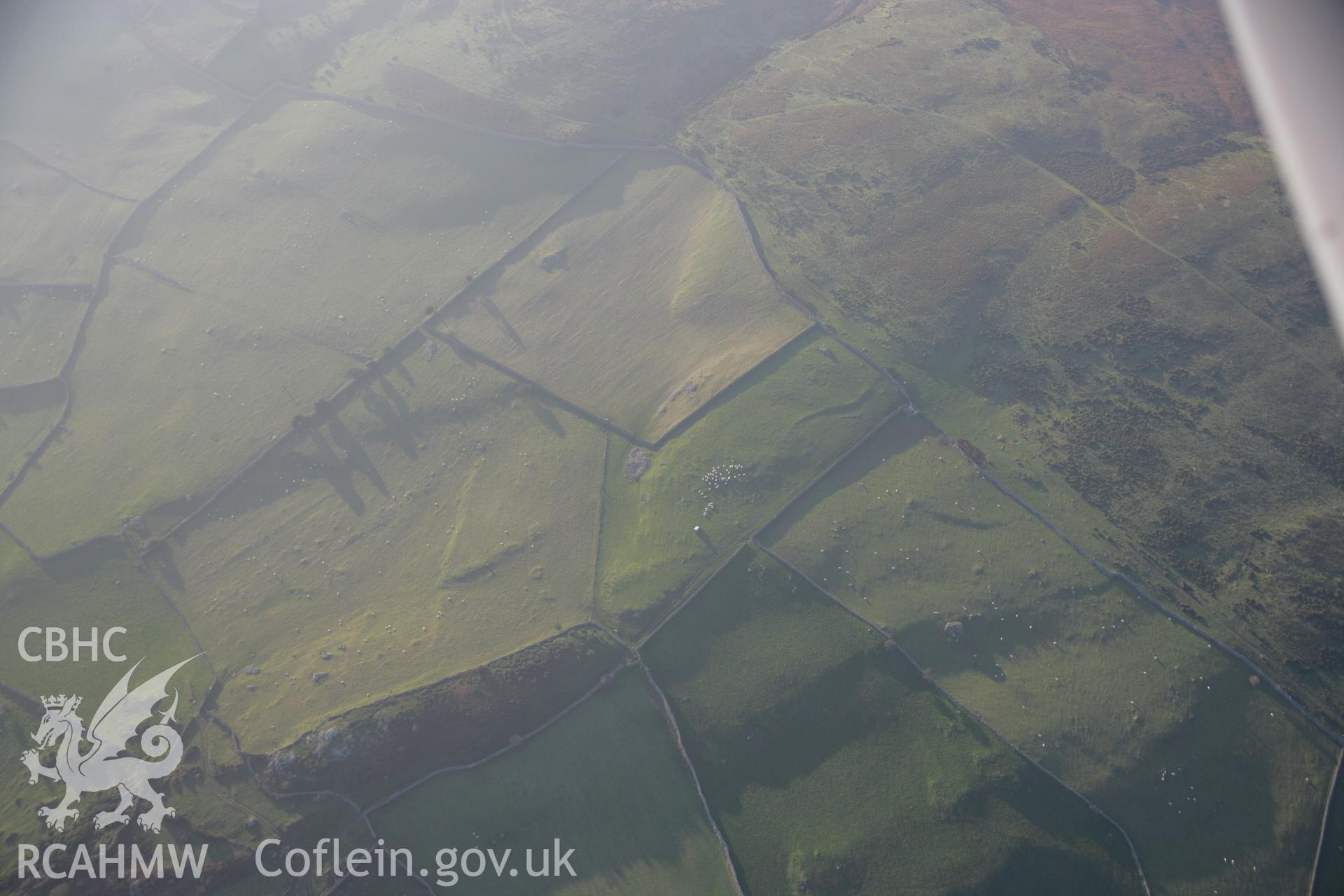 RCAHMW colour oblique aerial photograph of a stone Circle at Hafodtyviewed from the north-east. Taken on 21 November 2005 by Toby Driver