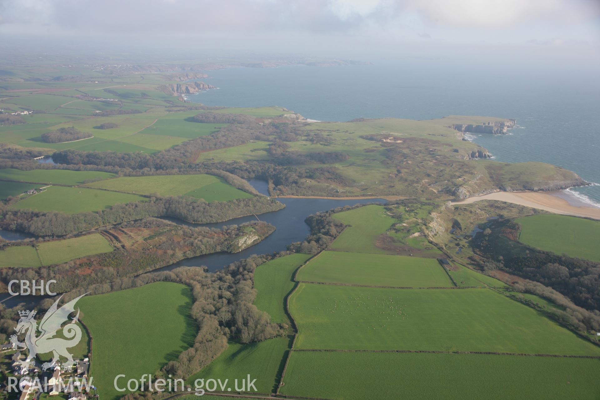 RCAHMW colour oblique aerial photograph of Bosherston Camp. A panoramic landscape from the west looking over Stackpole Warren. Taken on 19 November 2005 by Toby Driver