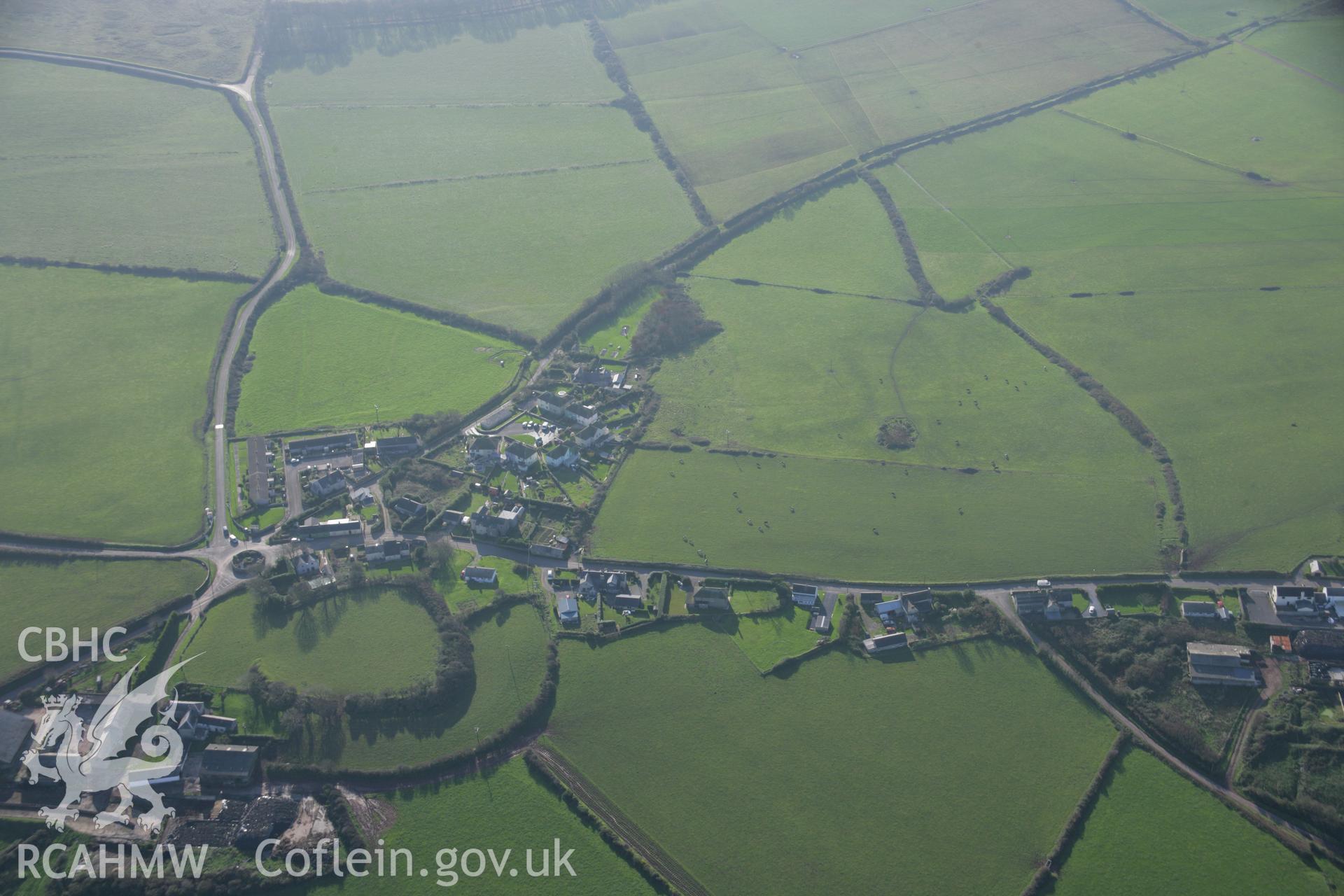 RCAHMW colour oblique aerial photograph of Castlemartin Castle from the north. Taken on 19 November 2005 by Toby Driver