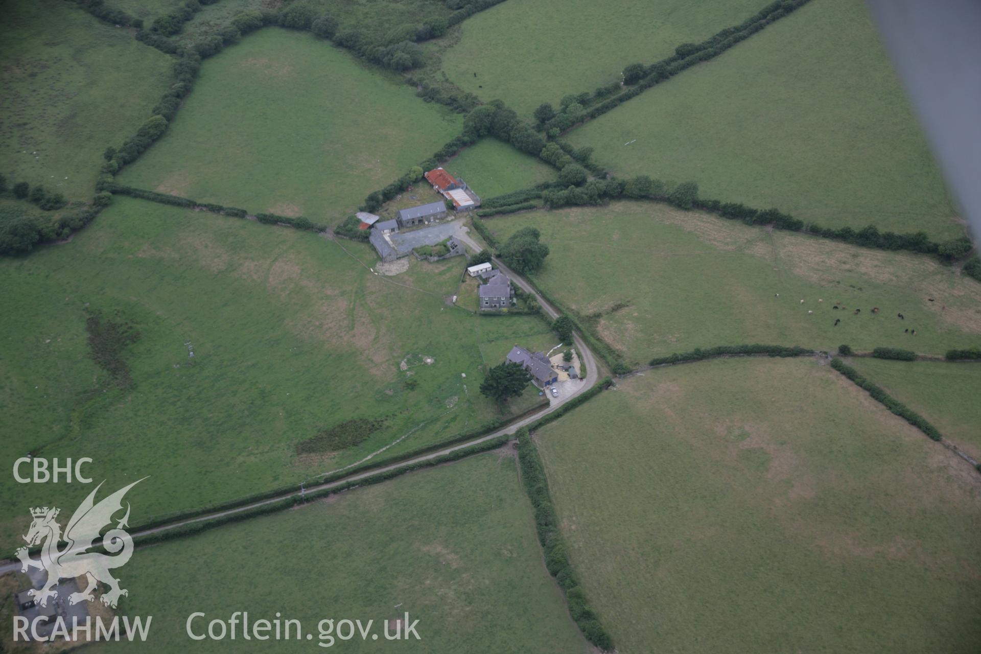 RCAHMW digital colour oblique photograph of the cropmarks of a possible defended enclosure at Bryn Marsli viewed from the east. Taken on 27/07/2005 by T.G. Driver.