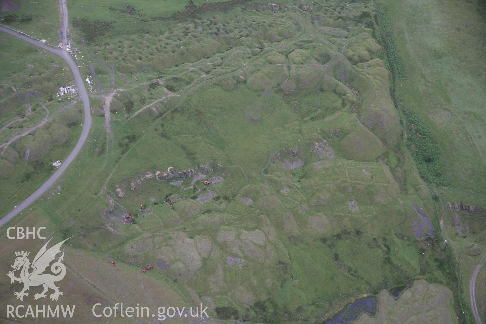 RCAHMW digital colour oblique photograph of a deserted iron mining village at Ffos-y-Fran. Taken on 07/07/2005 by T.G. Driver.