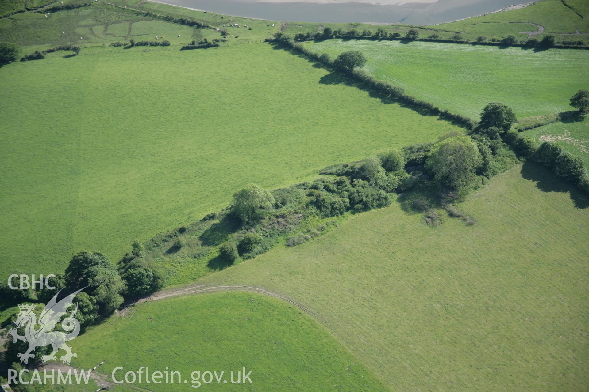 RCAHMW colour oblique aerial photograph of Castell Aber Taf, Motte and Bailey. Taken on 09 June 2005 by Toby Driver