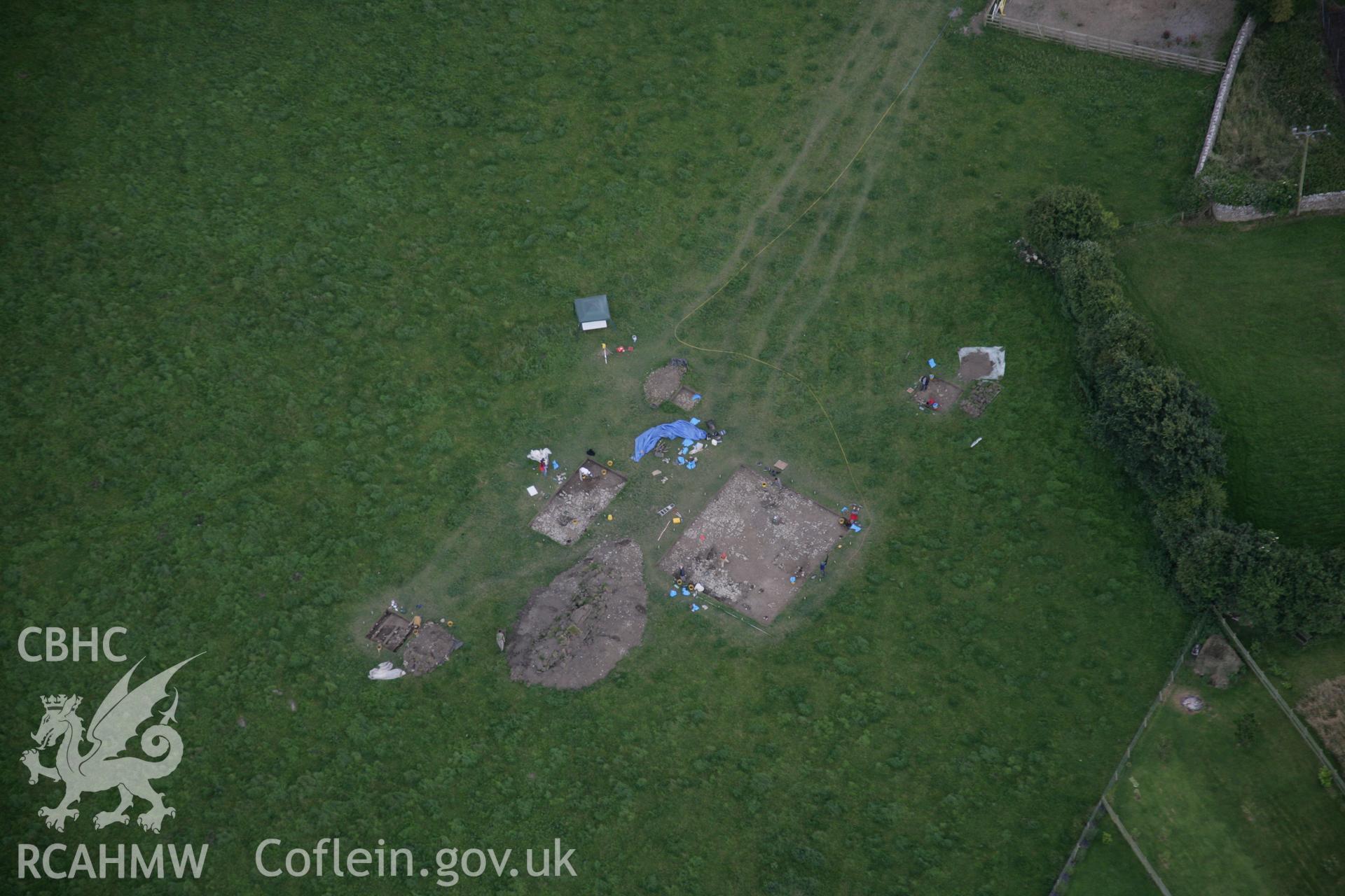 RCAHMW digital colour oblique photograph of excavations by the National Museum of Wales at the Llanmaes Prehistoric Settlement and hoard site. Taken on 07/07/2005 by T.G. Driver.