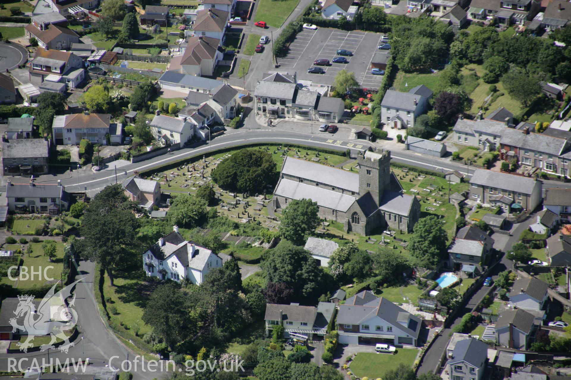 RCAHMW colour oblique aerial photograph of St Crallog's Church, Coychurch. Taken on 22 June 2005 by Toby Driver