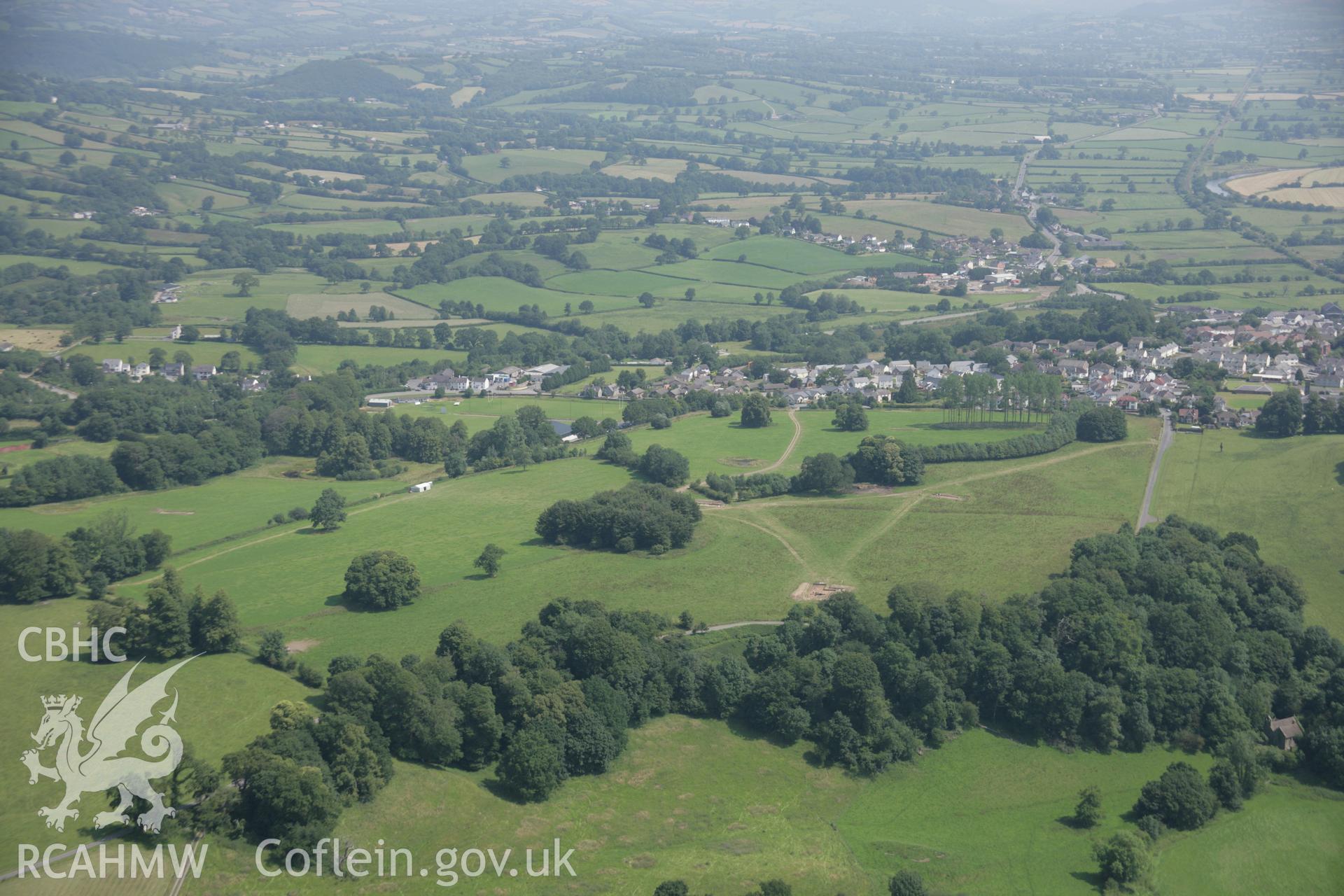 RCAHMW colour oblique aerial photograph of Dinefwr Park Roman Forts. A view of the parkland from the south-west showing excavation trenches. Taken on 11 July 2005 by Toby Driver