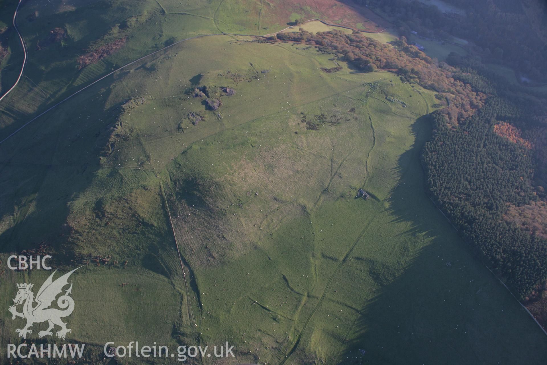 RCAHMW colour oblique aerial photograph of a field system northeast of Maes-y-Gaer viewed from the north-west. Taken on 21 November 2005 by Toby Driver