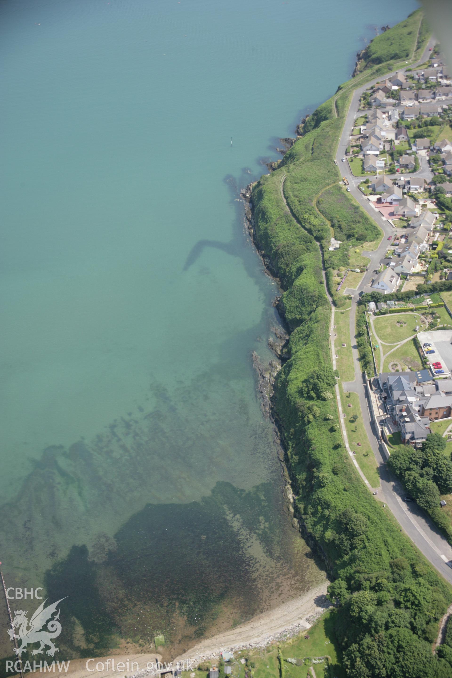 RCAHMW colour oblique aerial photograph of Fishguard Harbour South-East Fish Trap from the west. Taken on 11 July 2005 by Toby Driver