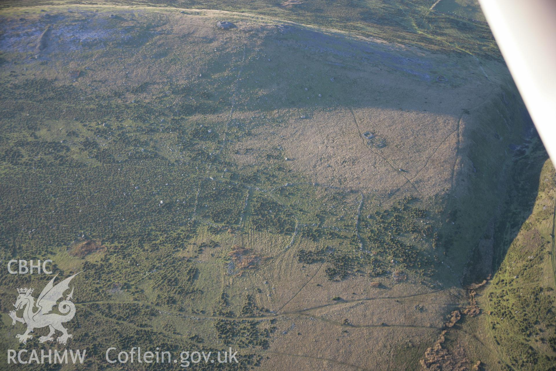 RCAHMW colour oblique aerial photograph of Moel Faban Settlement and cairnfield, viewed from the south-east. Taken on 21 November 2005 by Toby Driver