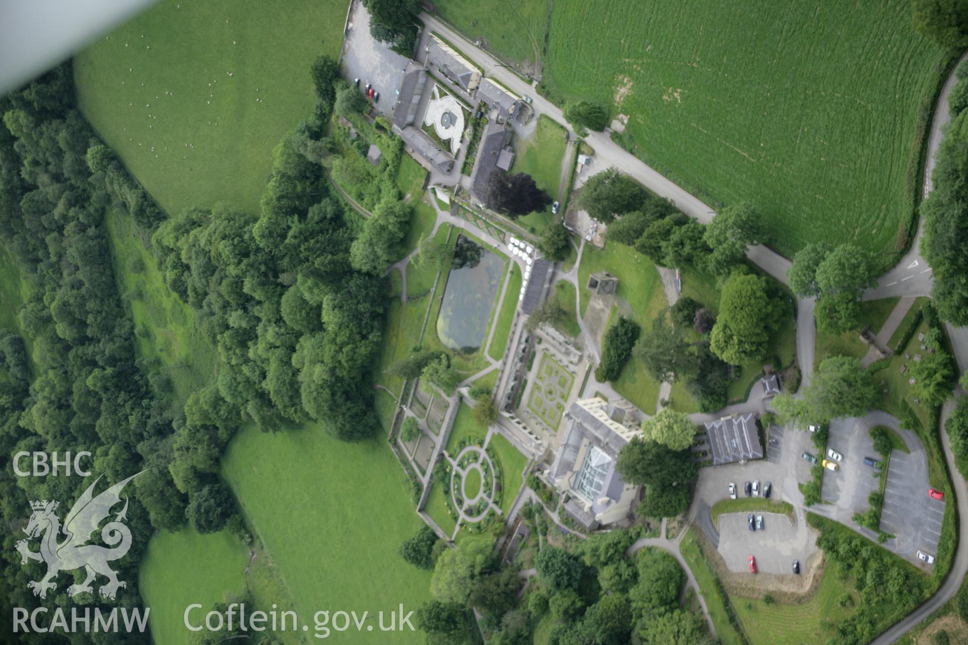 RCAHMW colour oblique aerial photograph of Aberglasney Garden, Llangathen. A general view from the east. Taken on 09 June 2005 by Toby Driver