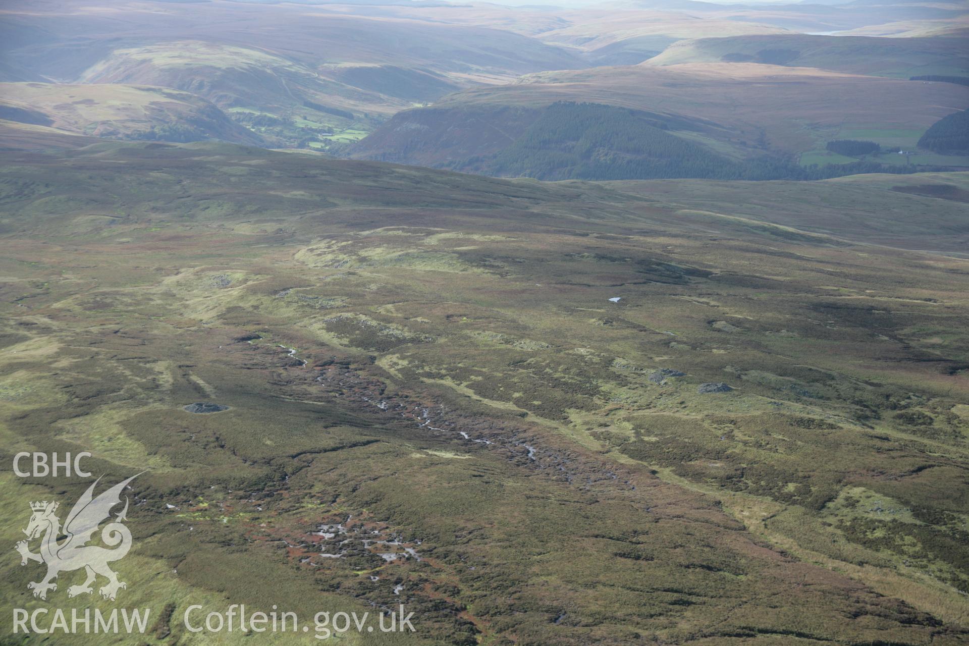 RCAHMW colour oblique aerial photograph of Gamriw Cairn IV in general view from the south-east. Taken on 13 October 2005 by Toby Driver