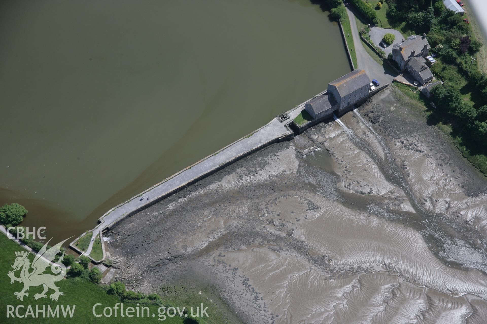 RCAHMW colour oblique aerial photograph of Carew Tide Mill from the north-west. Taken on 22 June 2005 by Toby Driver