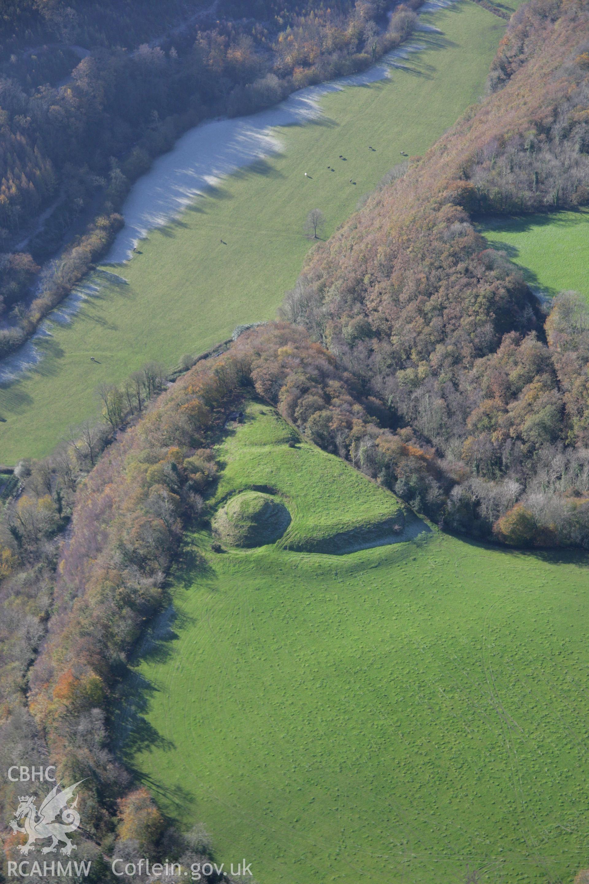 RCAHMW colour oblique photograph of Allt y Ferin, motte and bailey castle, view from north-east. Taken by Toby Driver on 17/11/2005.