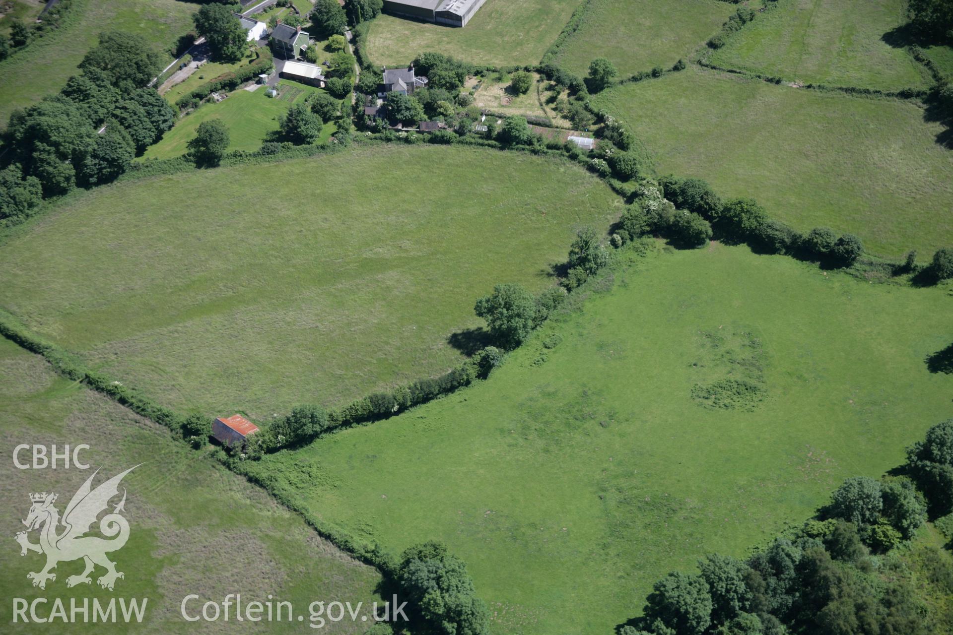 RCAHMW colour oblique aerial photograph of Burial Chamber, Coedparcgarw. A missed shot looking south-east. Taken on 22 June 2005 by Toby Driver