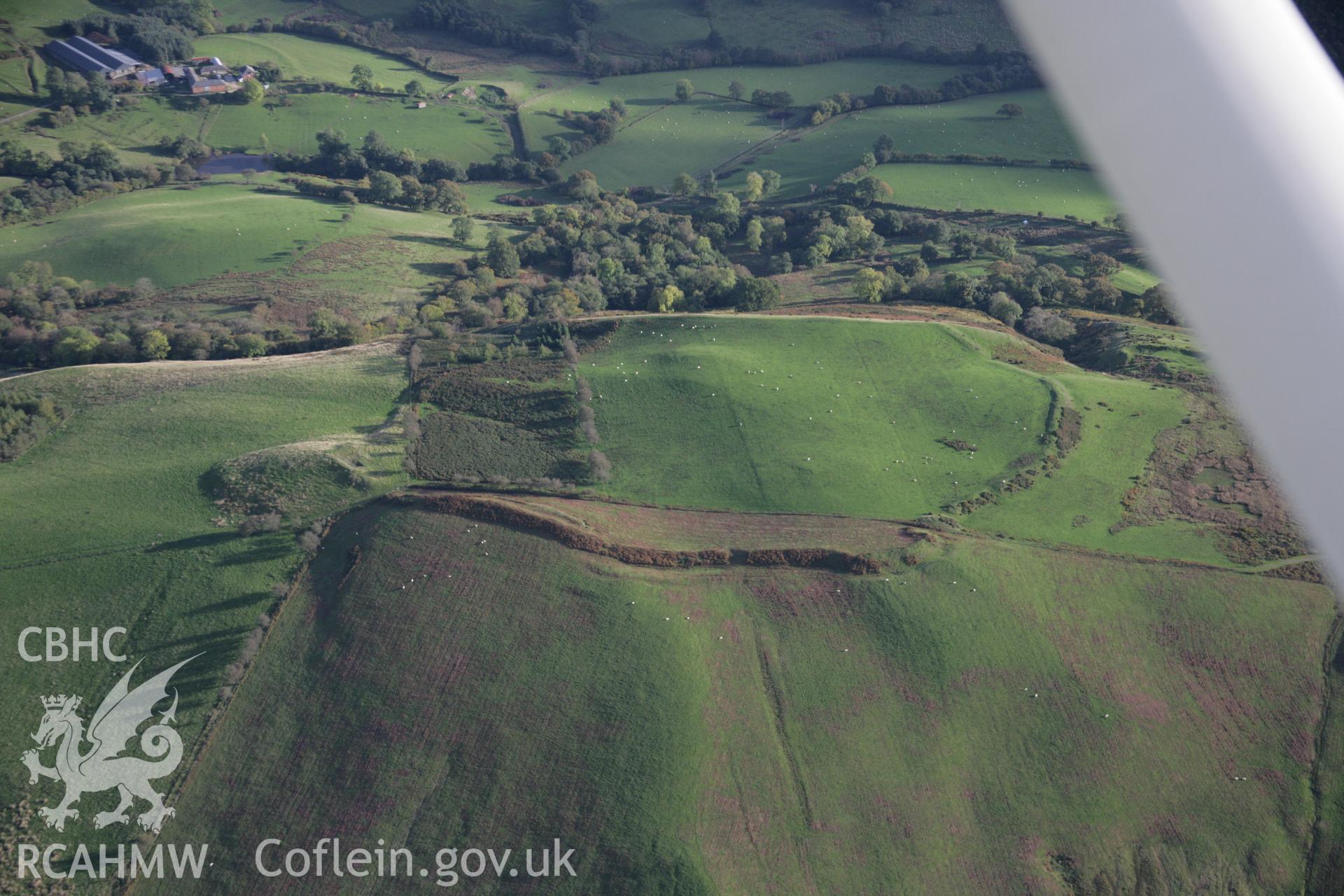 RCAHMW colour oblique aerial photograph of Cefn-y-Gaer Enclosure from the north. Taken on 13 October 2005 by Toby Driver