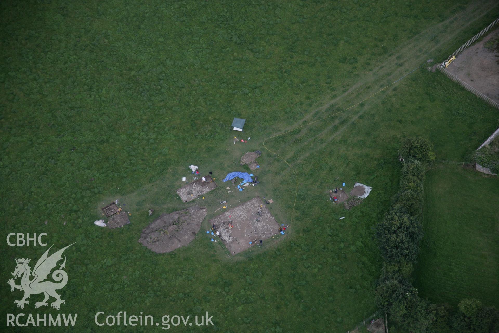 RCAHMW digital colour oblique photograph of excavations by the National Museum of Wales at the Llanmaes Prehistoric Settlement and hoard site. Taken on 07/07/2005 by T.G. Driver.