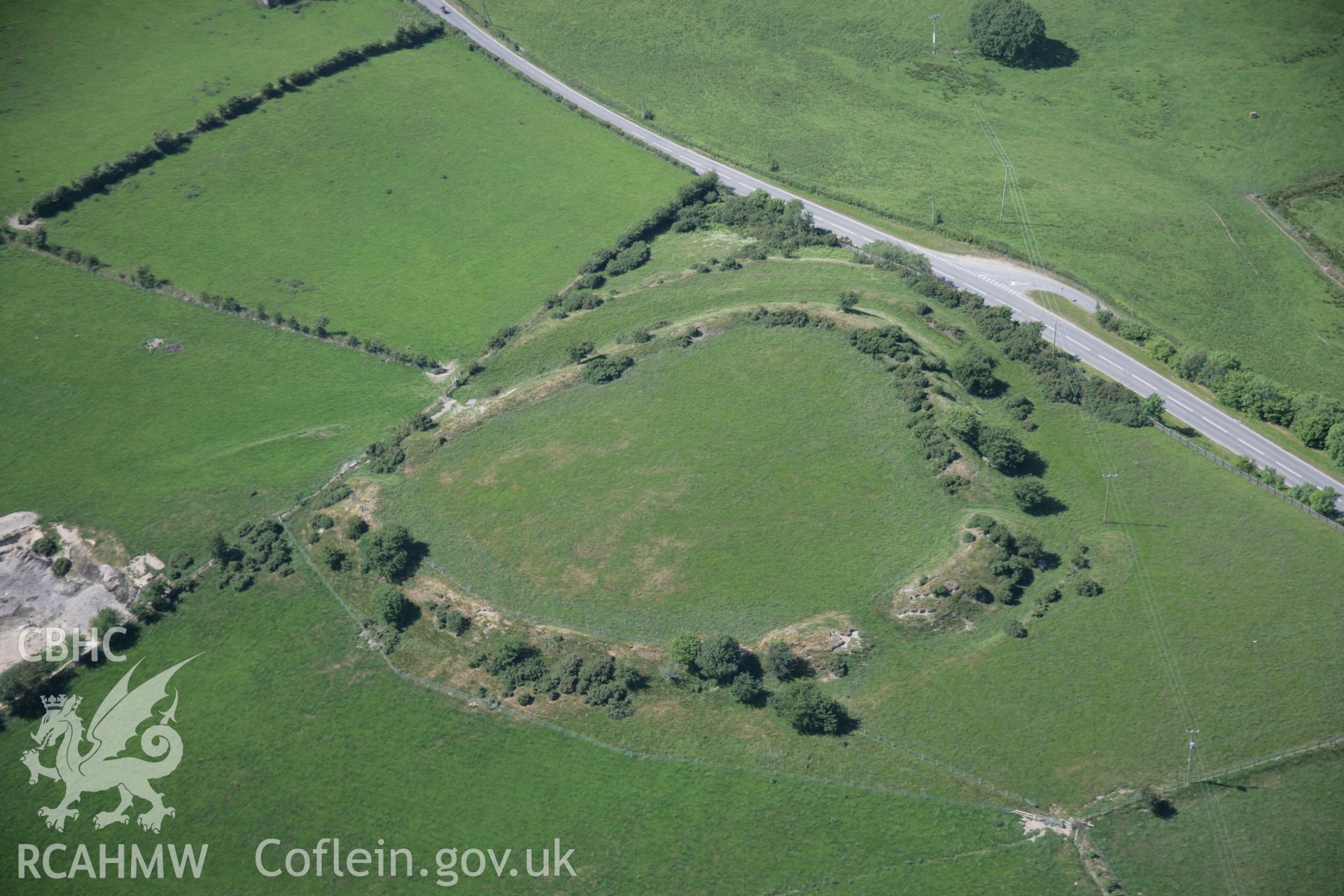 RCAHMW colour oblique aerial photograph of Castell Flemish Hillfort, Ty'n-Yr-Eithin, near Tregaron from the south-east. Taken on 23 June 2005 by Toby Driver