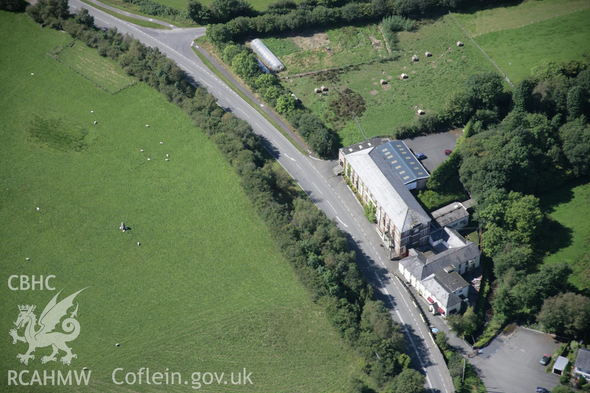 RCAHMW colour oblique aerial photograph of Cae'r Maen and  Cambrian Woollen Mill, Llanwrtyd Wells. Taken on 02 September 2005 by Toby Driver