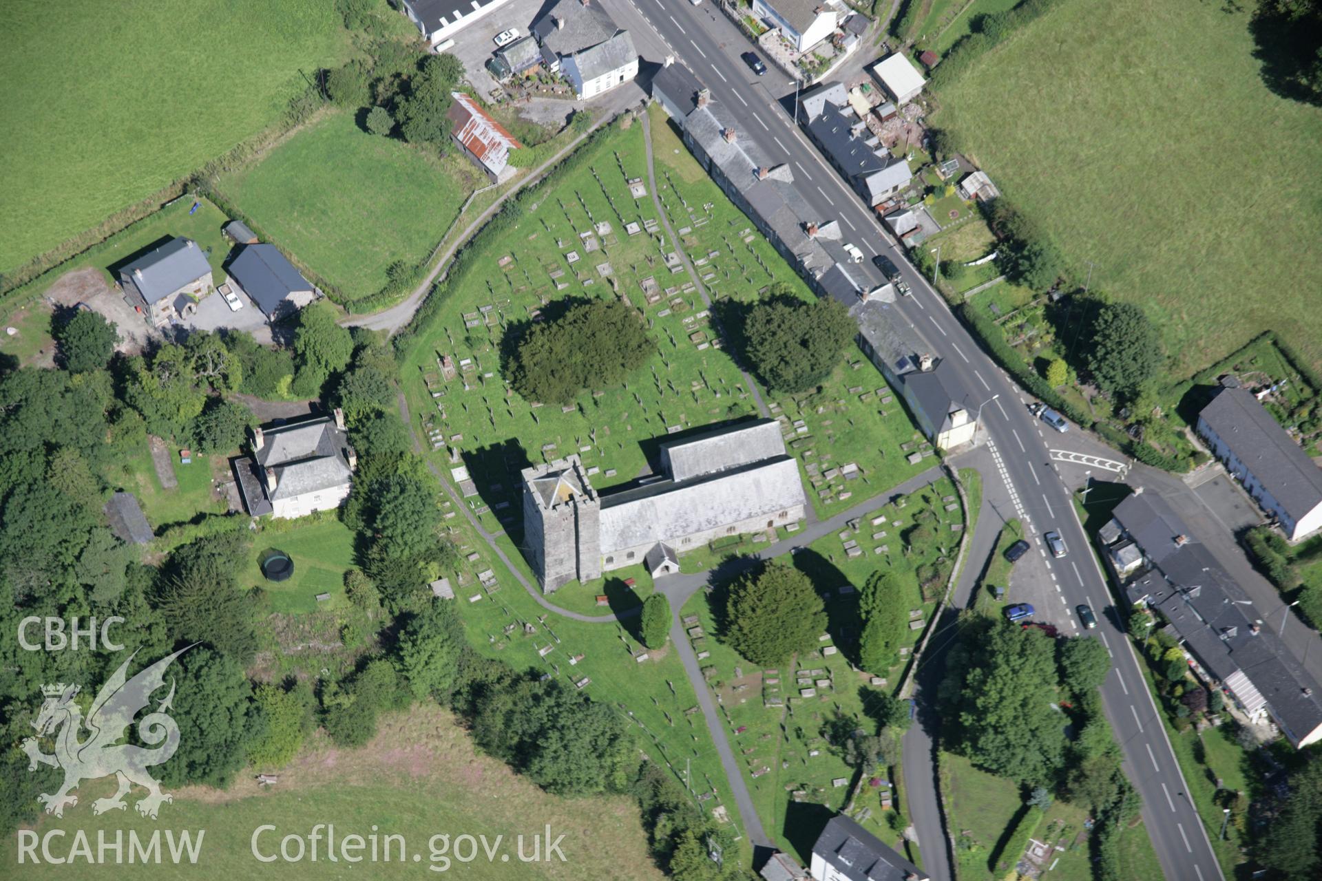 RCAHMW colour oblique aerial photograph of St Cynog's Church, Defynnog, from the south. Taken on 02 September 2005 by Toby Driver