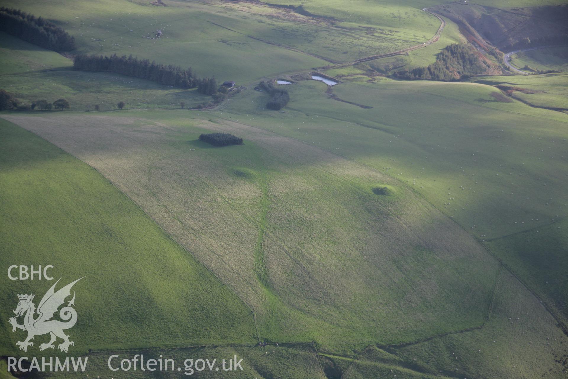 RCAHMW colour oblique aerial photograph of Glog Barrow IX, in general view from north-east. Taken on 13 October 2005 by Toby Driver