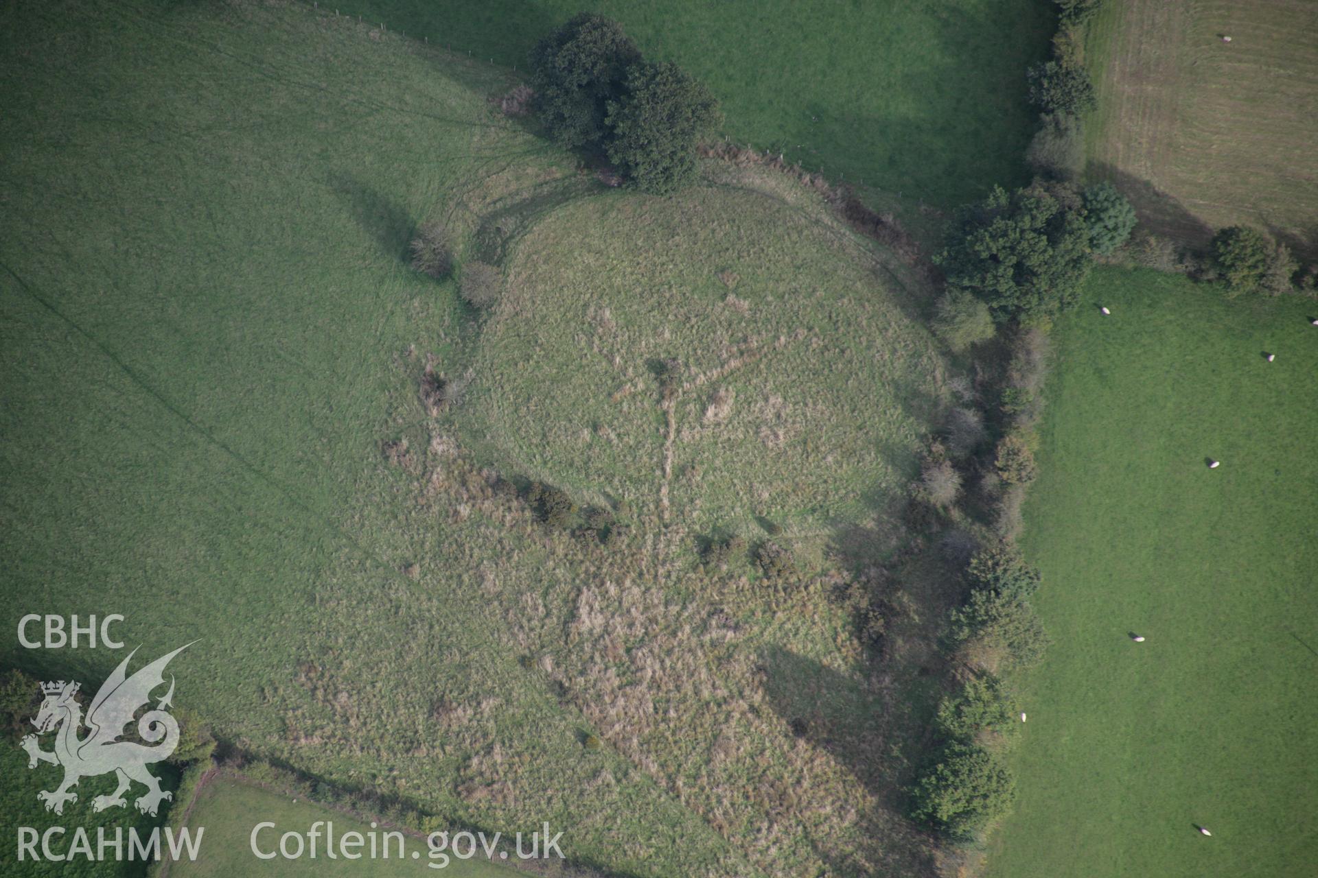 RCAHMW colour oblique aerial photograph of Caer Du Defended Enclosure looking east. Taken on 13 October 2005 by Toby Driver