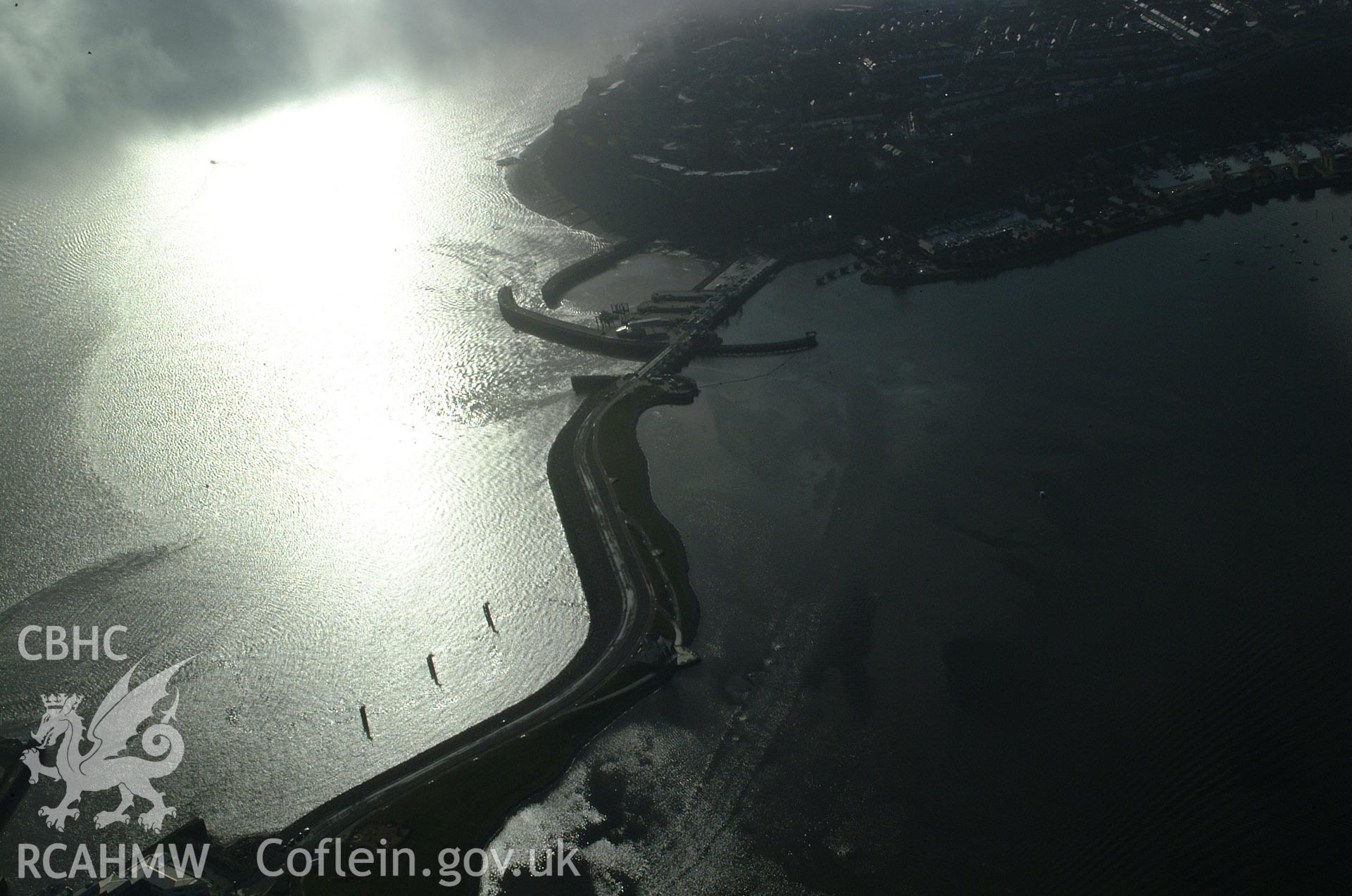 RCAHMW colour oblique aerial photograph of Cardiff Bay Barrage taken on 13/01/2005 by Toby Driver