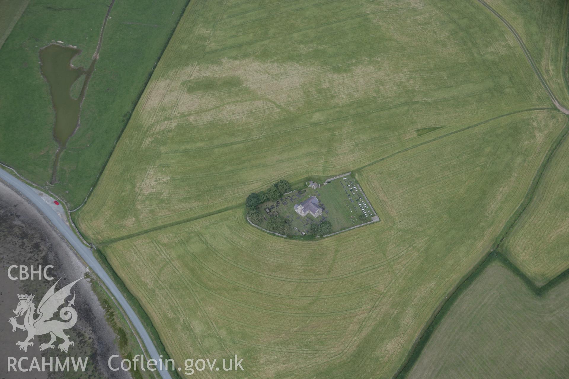 RCAHMW digital colour oblique photograph of St. Baglan's Church Enclosure Complex viewed from the south. Taken on 02/08/2005 by T.G. Driver.