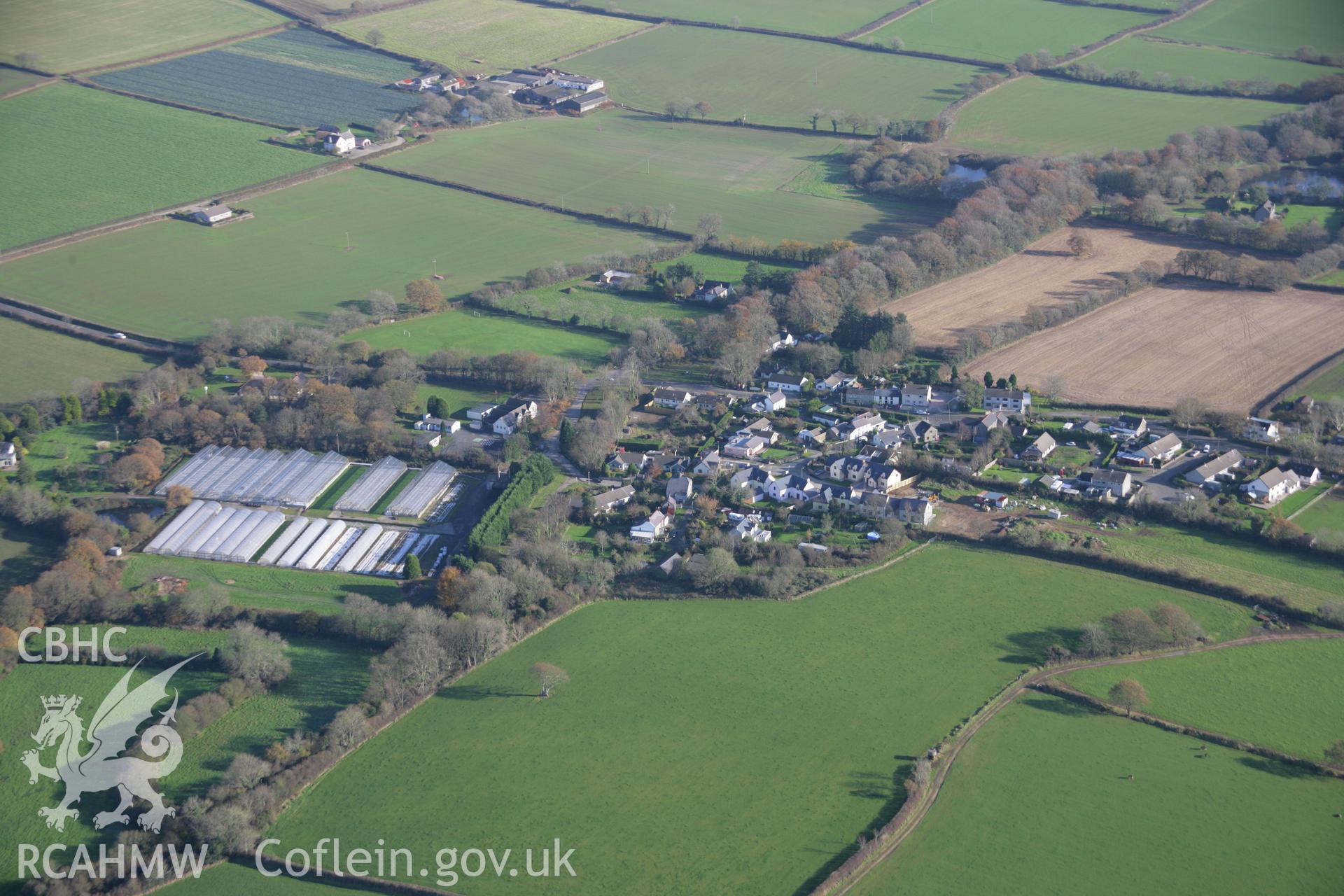 RCAHMW colour oblique aerial photograph of Bishops Well, Houghton, from the west. Taken on 19 November 2005 by Toby Driver