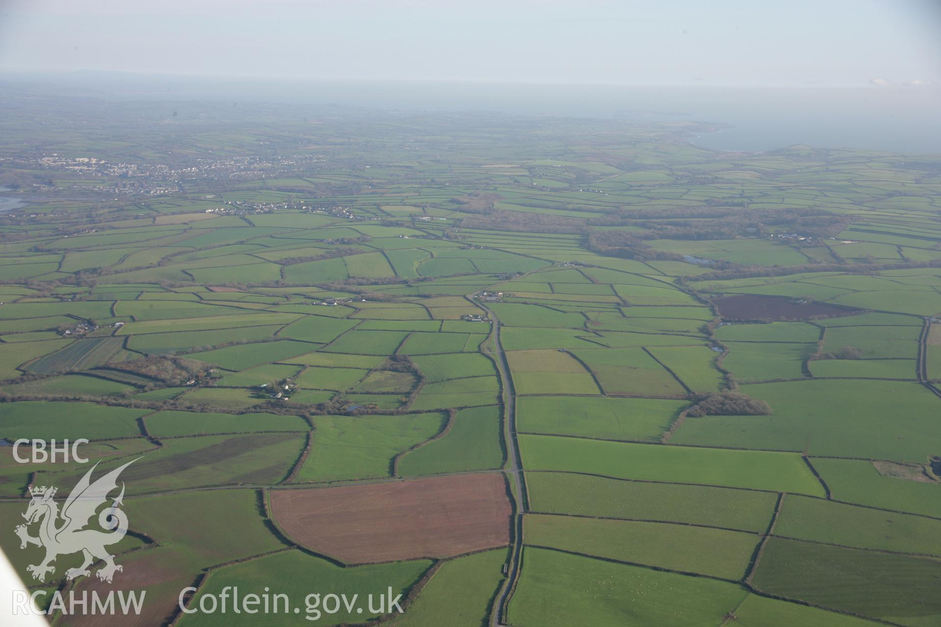 RCAHMW colour oblique aerial photograph of Wallaston Round Barrow Cemetary, in wide view from the west with the ridgeway. Taken on 19 November 2005 by Toby Driver