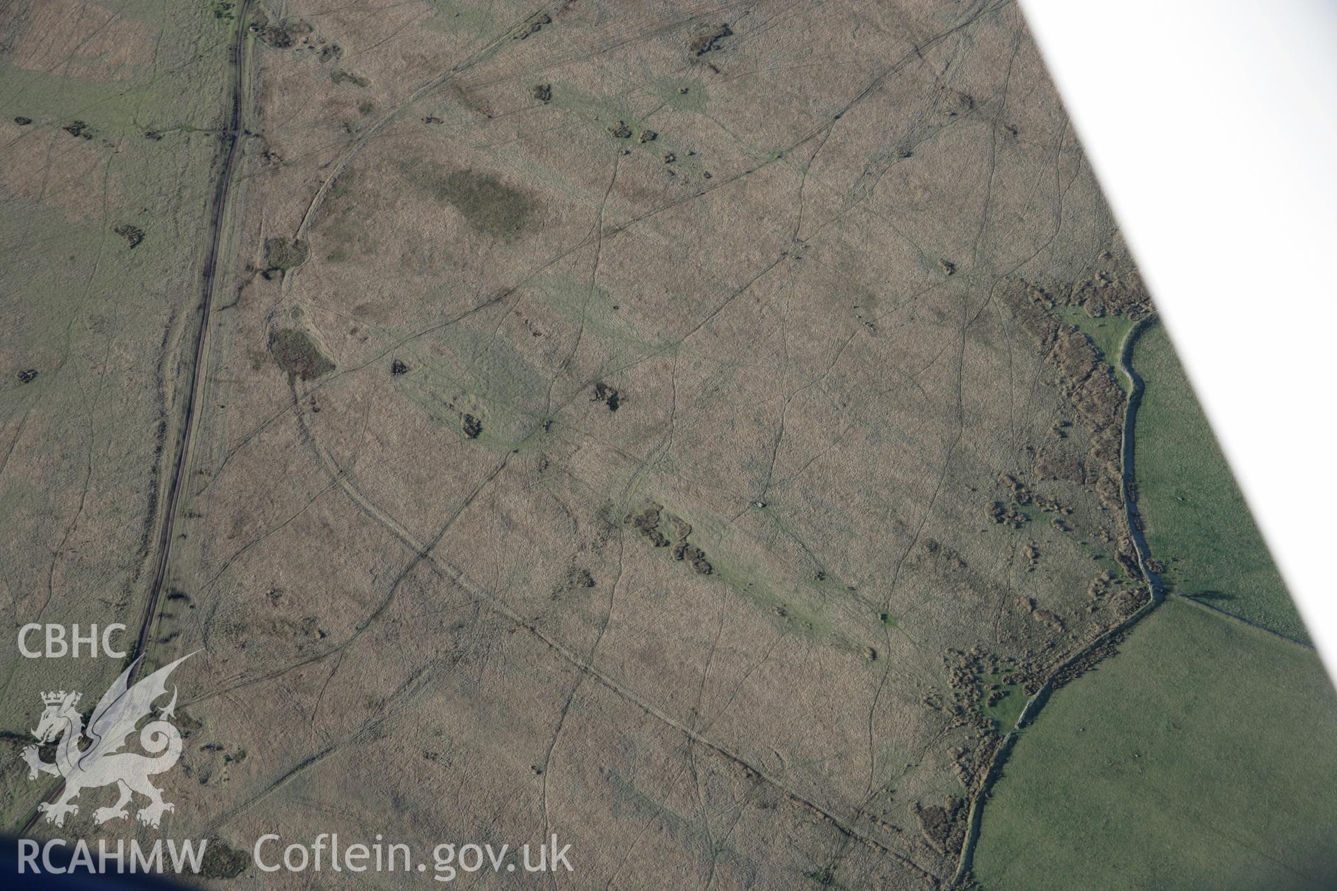 RCAHMW colour oblique photograph of Trecastle Mountain stone circles, view from east. Taken by Toby Driver on 17/11/2005.