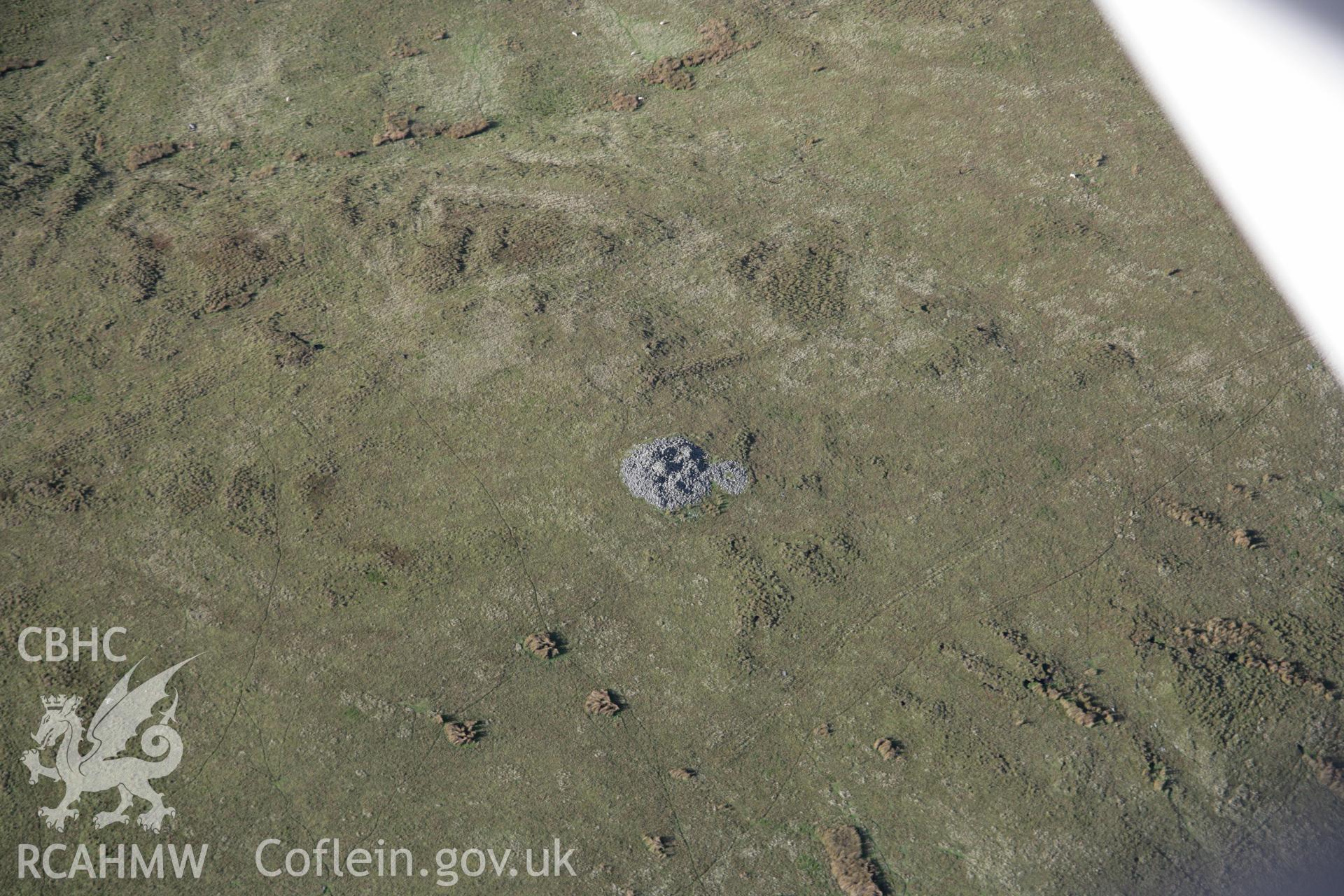 RCAHMW colour oblique aerial photograph of Graig Ddu Cairn II from the south-east. Taken on 13 October 2005 by Toby Driver