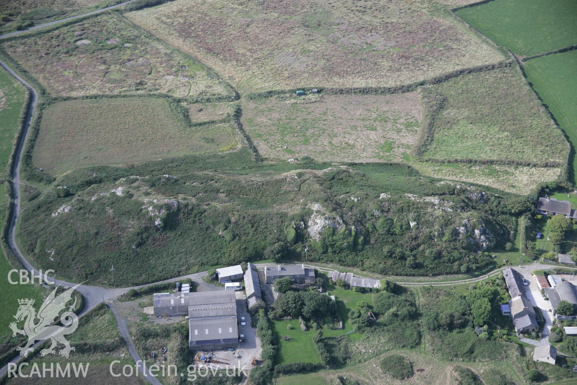 RCAHMW digital colour oblique photograph of Clegyr Boia Defended Settlement viewed from the south-east. Taken on 01/09/2005 by T.G. Driver.