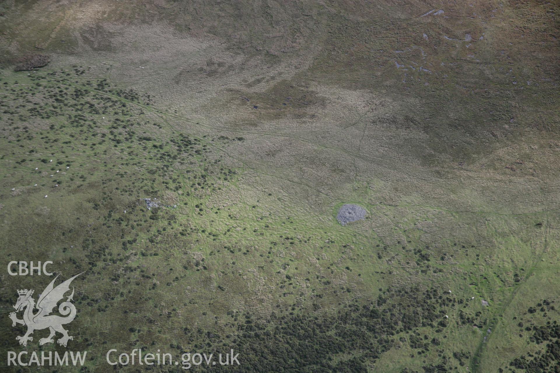 RCAHMW colour oblique aerial photograph of Banc Ystrad Wen, Cairn I, viewed from the north-west. Taken on 13 October 2005 by Toby Driver