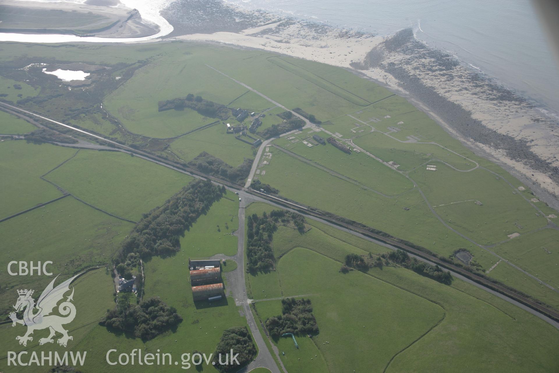 RCAHMW colour oblique aerial photograph of Tonfanau Army Camp from the north-east. Taken on 17 October 2005 by Toby Driver