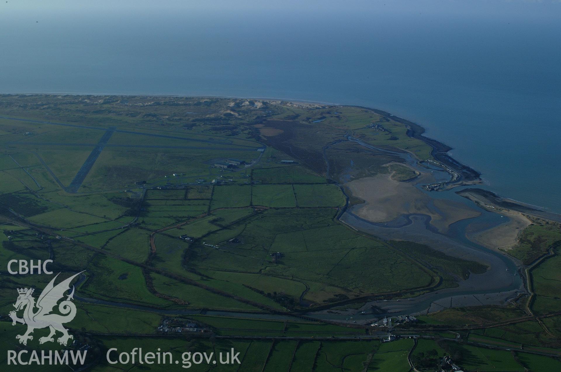 RCAHMW colour oblique aerial photograph of Mochras (Shell Island) taken on 24/01/2005 by Toby Driver