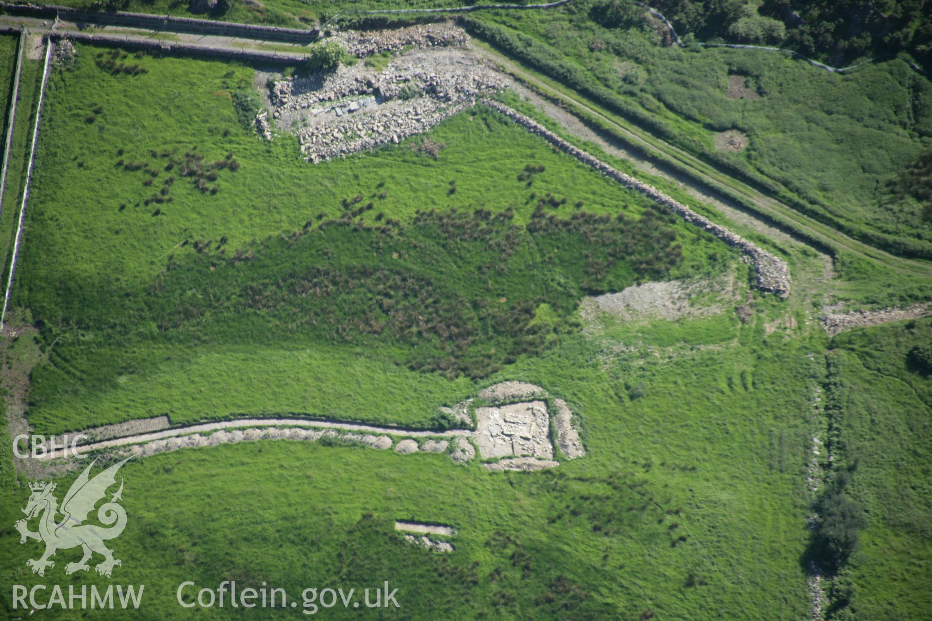 RCAHMW digital colour oblique photograph of a Roman Corn drier at Tremadog. Taken on 08/06/2005 by T.G. Driver.