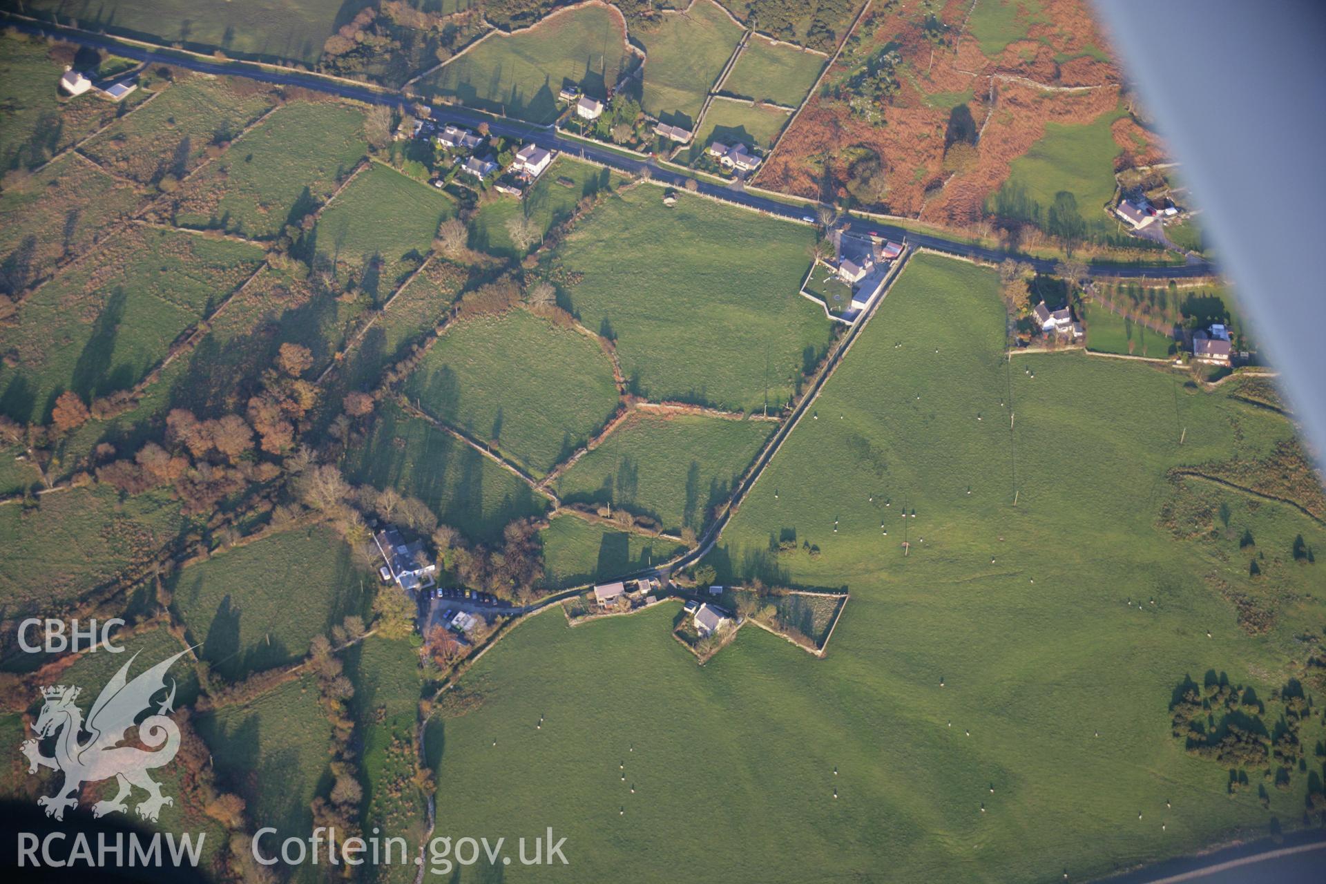 RCAHMW colour oblique aerial photograph of Rhiwen Early Field System from the south-west. Taken on 21 November 2005 by Toby Driver