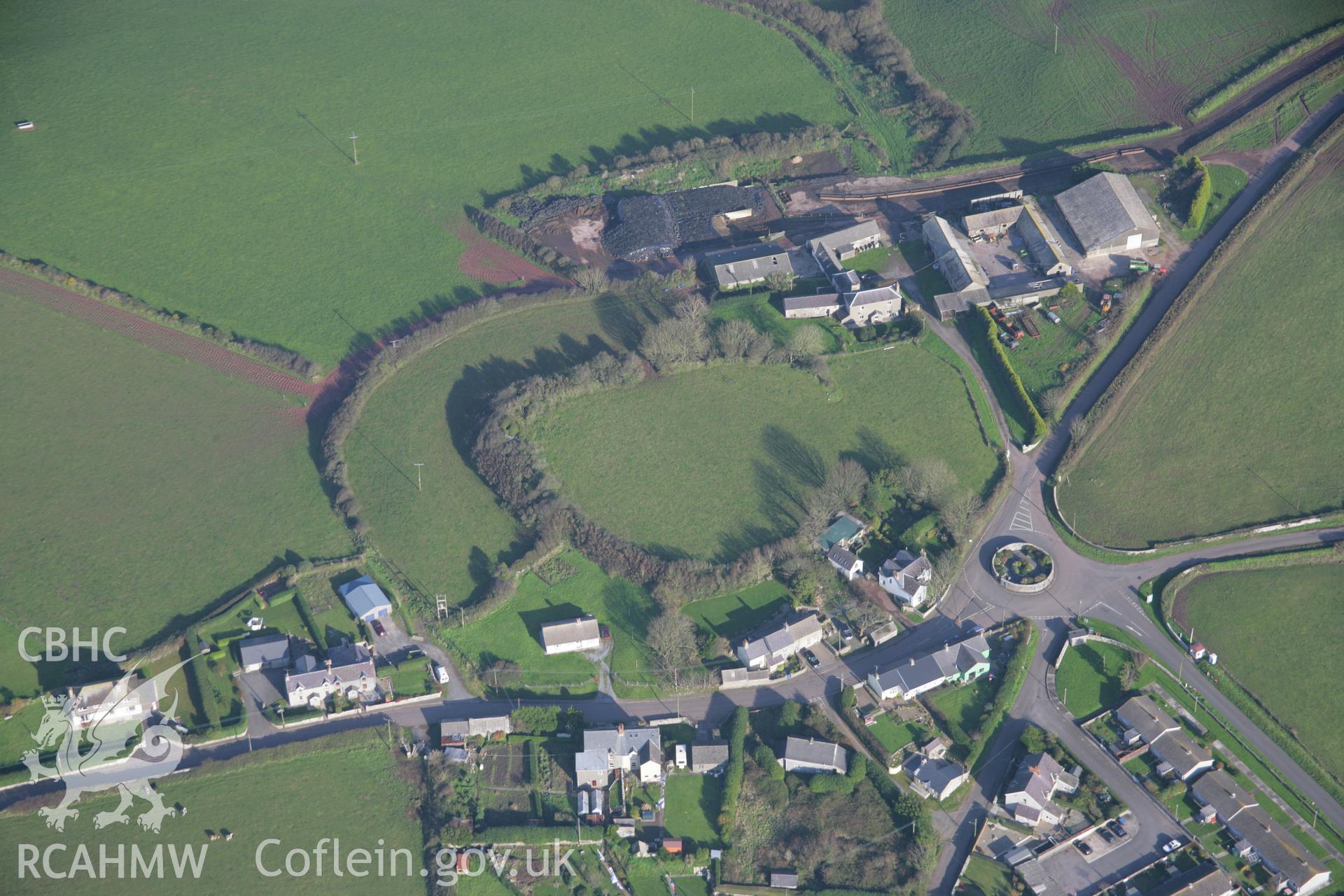 RCAHMW colour oblique aerial photograph of Castlemartin Castle from the south-west. Taken on 19 November 2005 by Toby Driver