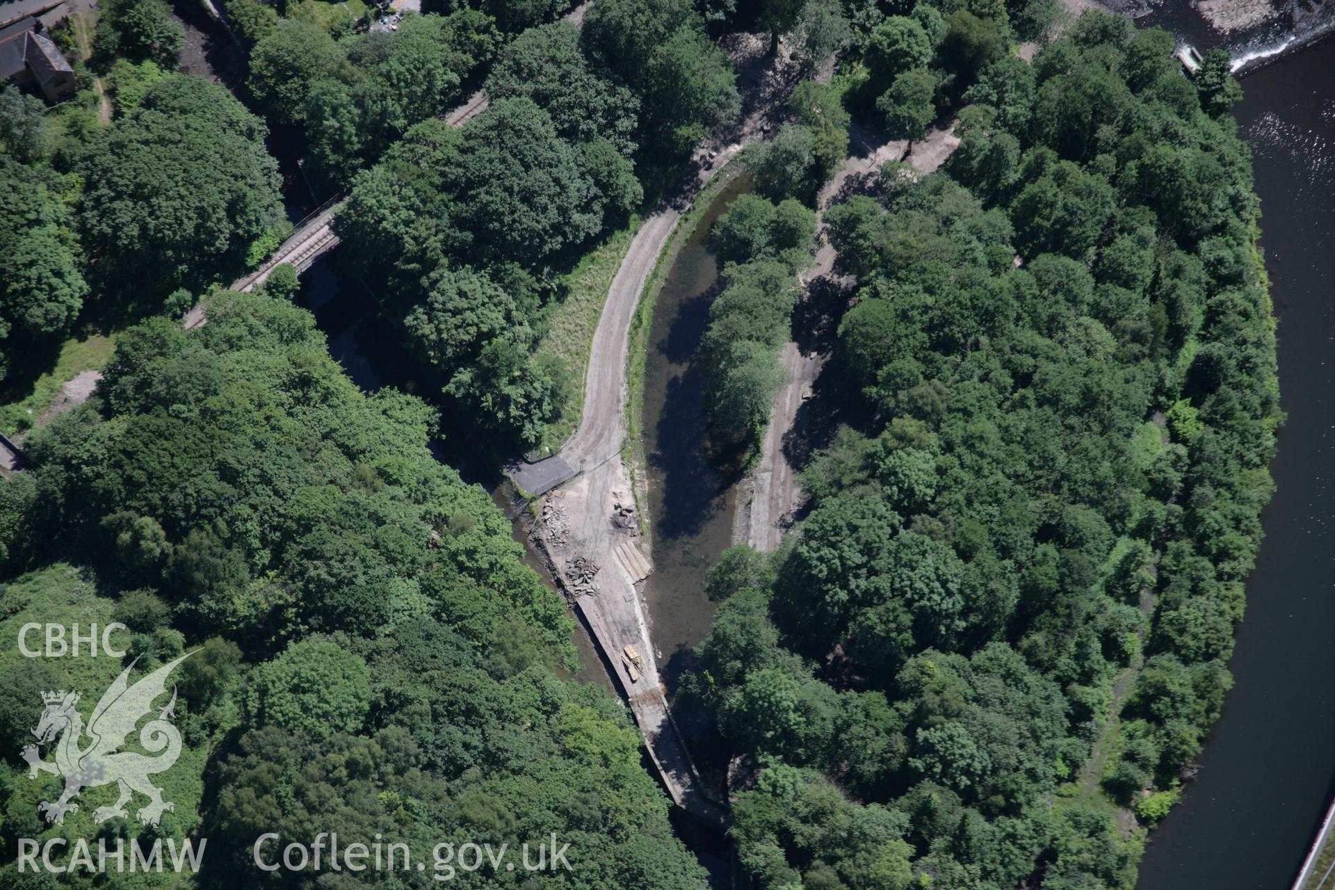 RCAHMW colour oblique aerial photograph of the Tennant Canal, Aberdulais Basin, showing the hulk of a narrow boat. Taken on 22 June 2005 by Toby Driver