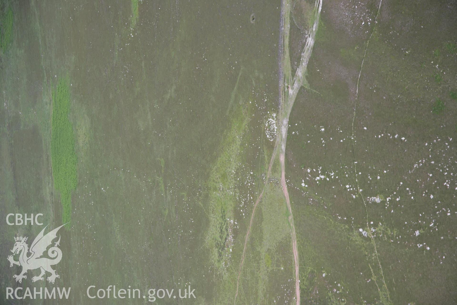 RCAHMW colour oblique aerial photograph of Rhossili Down Cairn II, viewed from the west. Taken on 22 June 2005 by Toby Driver