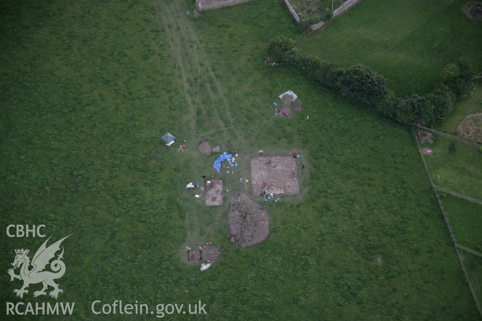 RCAHMW digital colour oblique photograph of excavations by the National Museum of Wales at the Llanmaes Prehistoric Settlement and hoard site. Taken on 07/07/2005 by T.G. Driver.