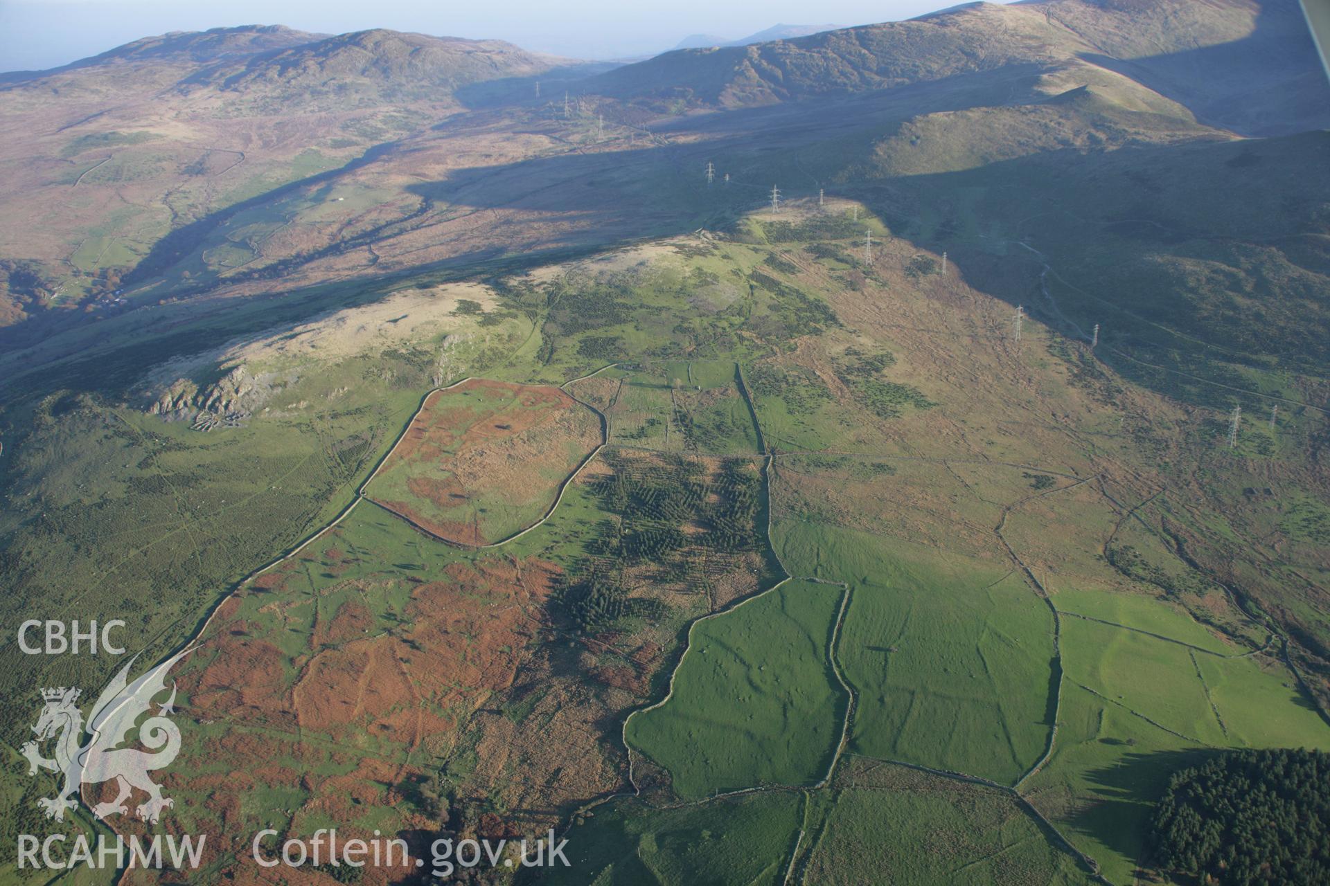 RCAHMW colour oblique aerial photograph of Cae'r Haidd Terraced Field System and deserted settlements looking south-east. Taken on 21 November 2005 by Toby Driver