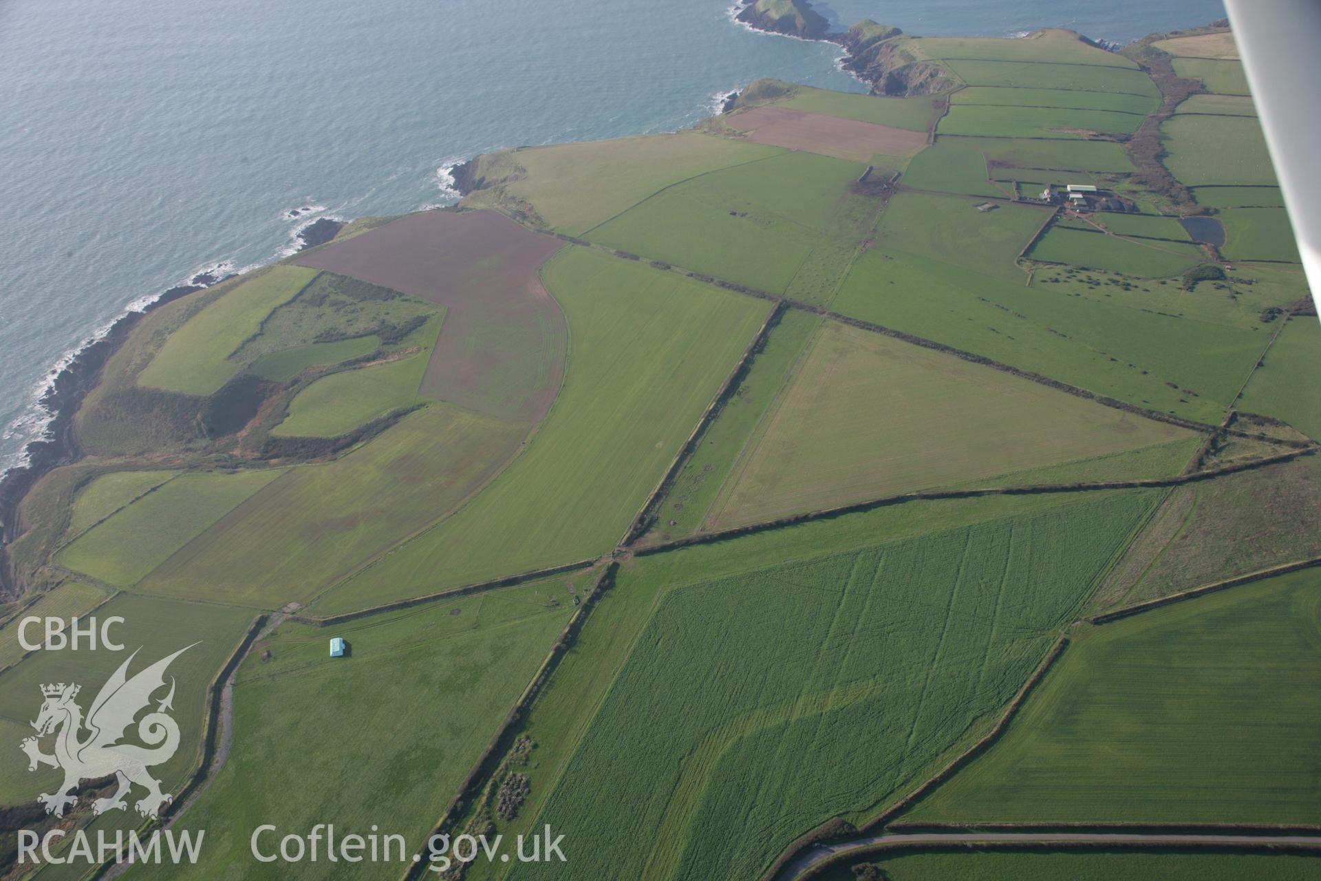 RCAHMW colour oblique aerial photograph of Angle Airfield from the east. Taken on 19 November 2005 by Toby Driver