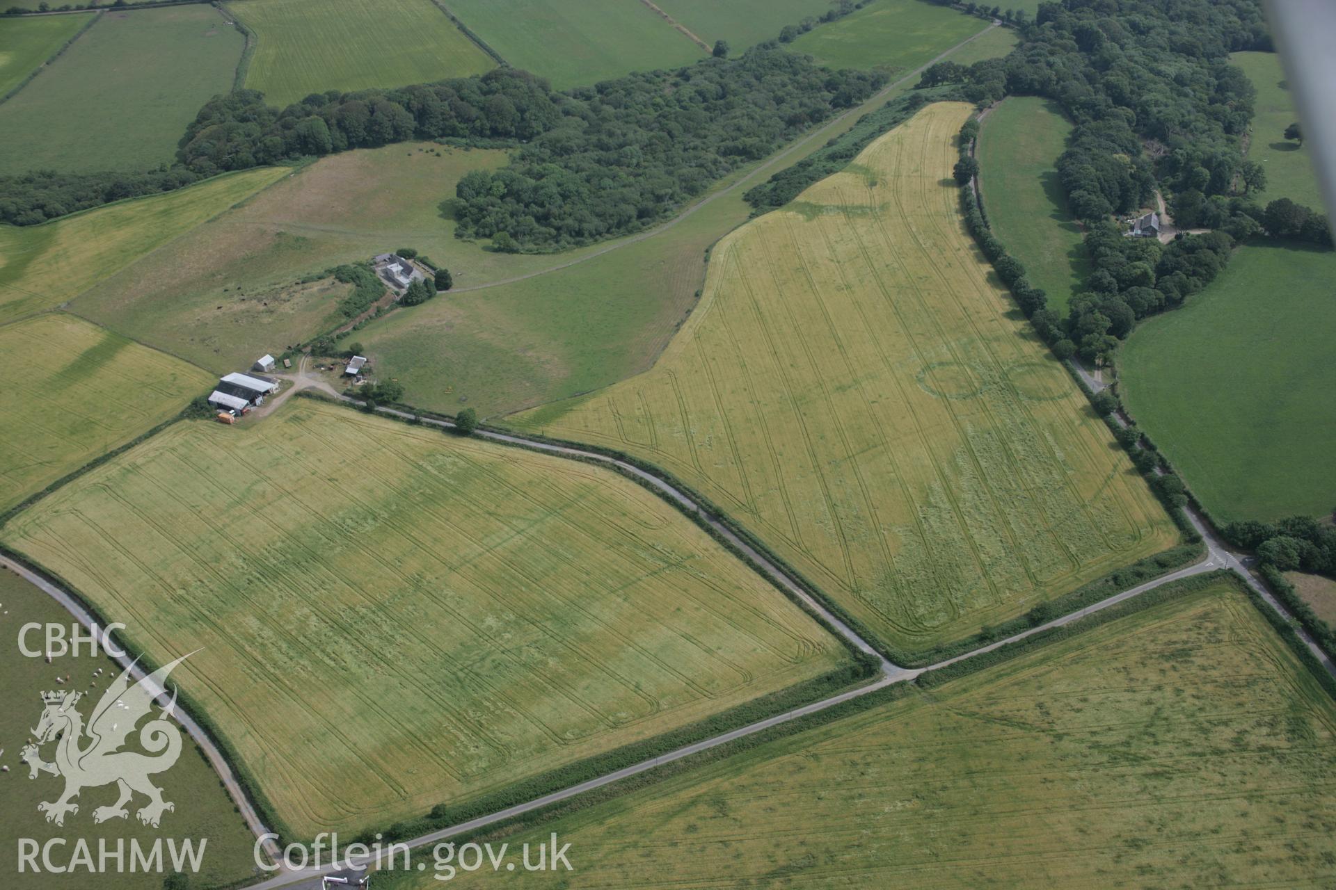 RCAHMW digital colour oblique photograph of cropmarks of relict field systems east of Pen Bryn Adda from the south-west. Taken on 27/07/2005 by T.G. Driver.