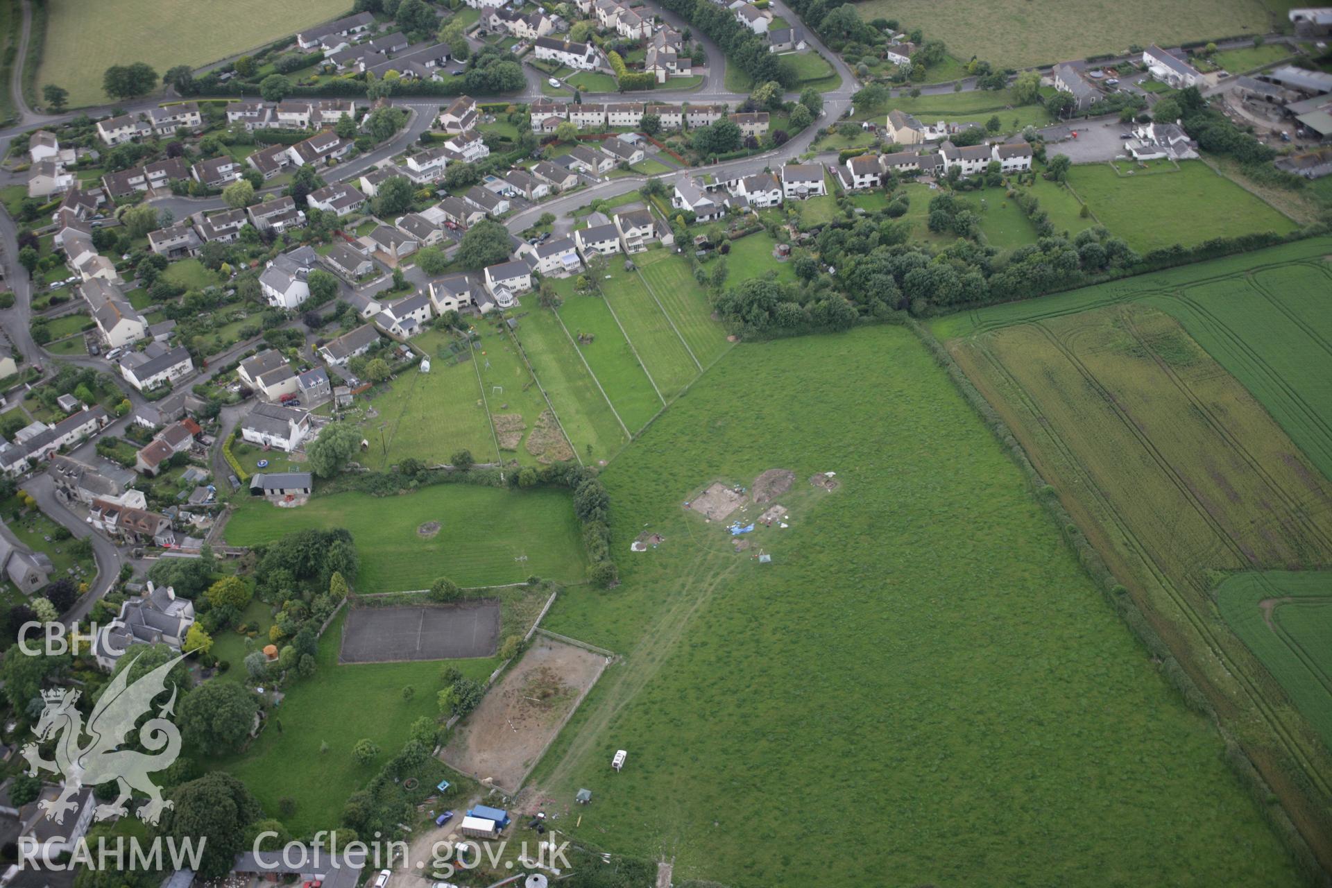 RCAHMW digital colour oblique photograph of excavations by the National Museum of Wales at the Llanmaes prehistoric settlement and hoard site viewed from the south-east. Taken on 07/07/2005 by T.G. Driver.