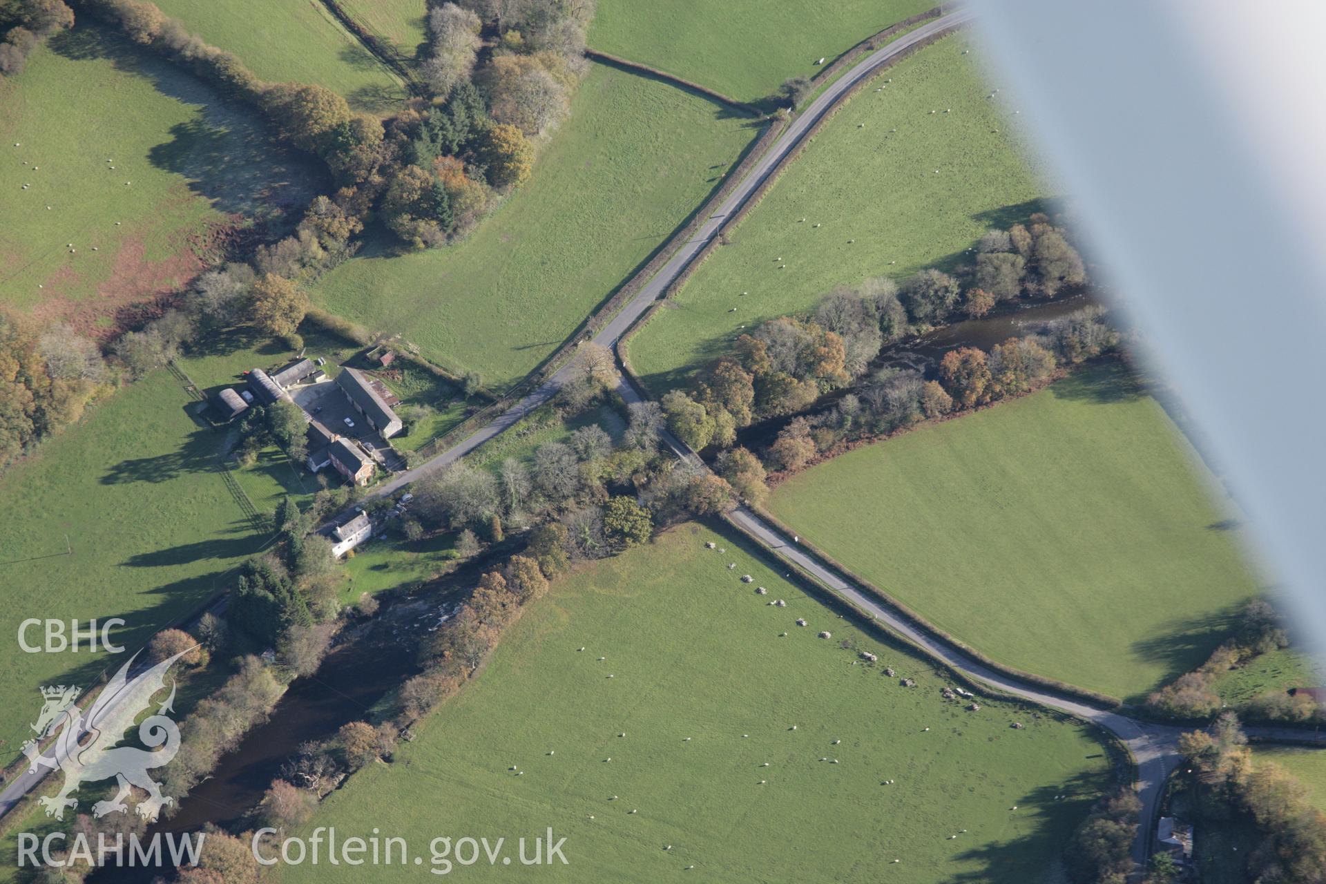 RCAHMW colour oblique photograph of Dolauhirion Bridge, view from north-west. Taken by Toby Driver on 17/11/2005.