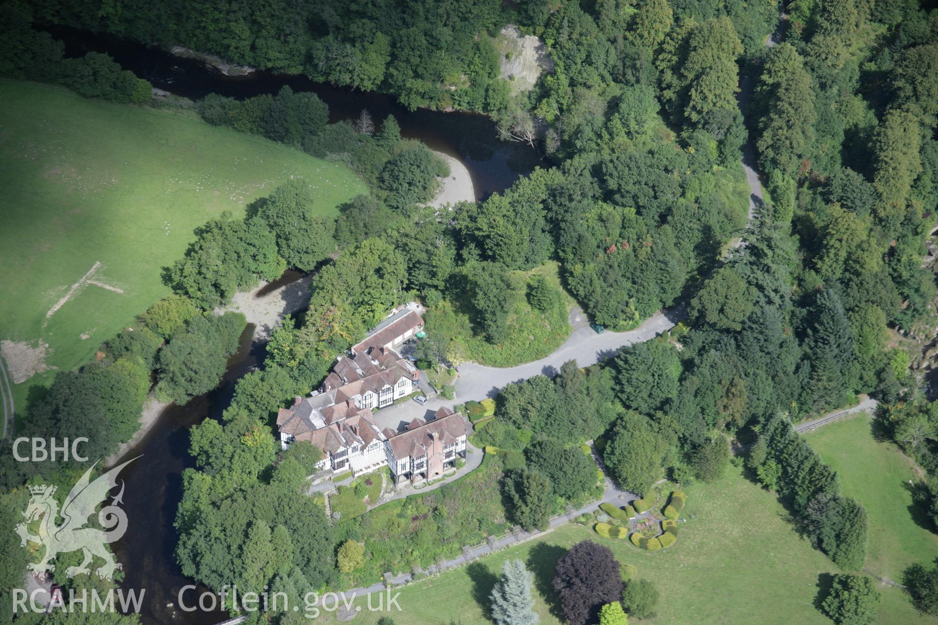 RCAHMW colour oblique aerial photograph of Caer Beris from the south-west. Taken on 02 September 2005 by Toby Driver