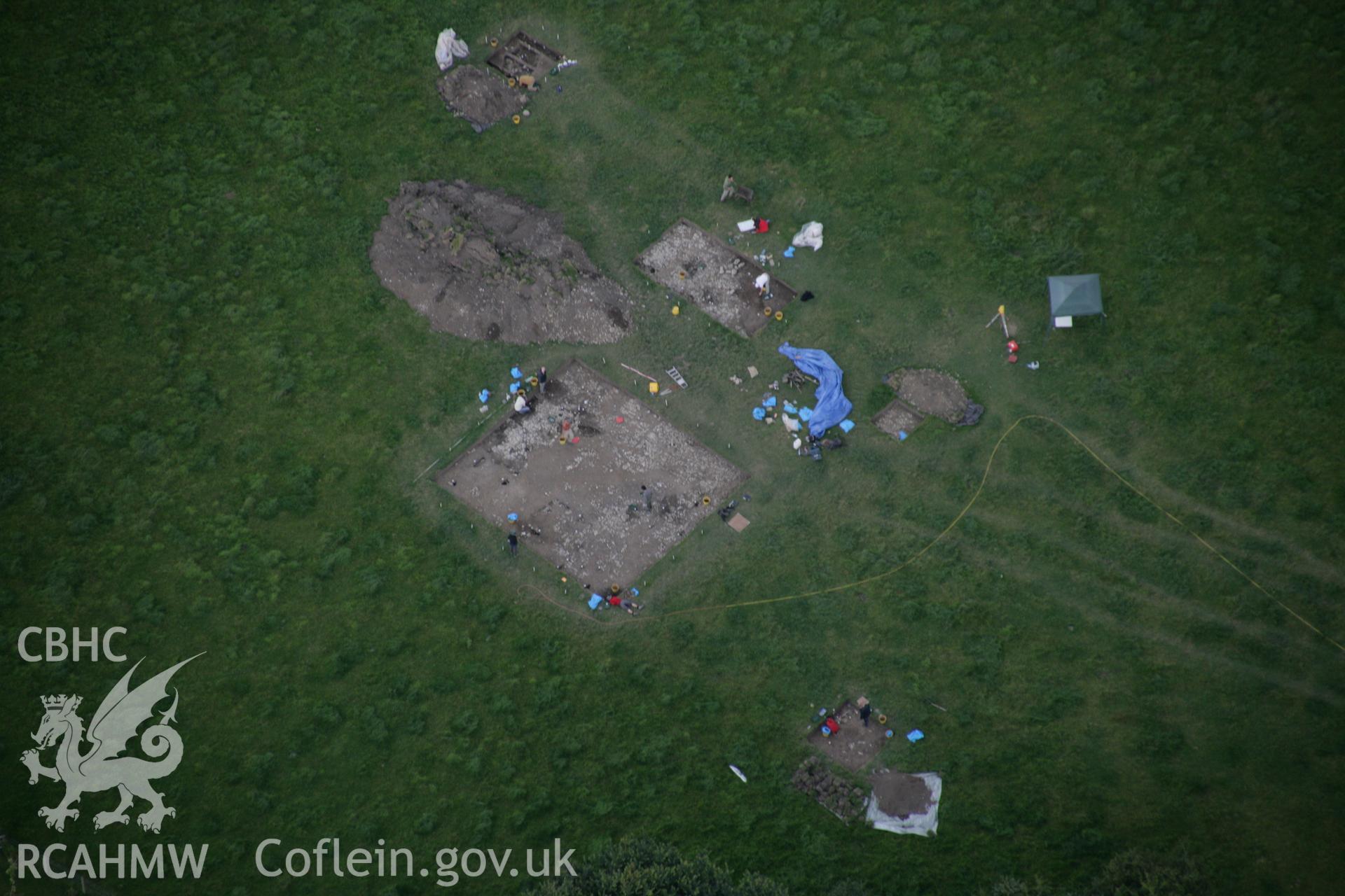 RCAHMW digital colour oblique photograph of excavations by the National Museum of Wales at the Llanmaes Prehistoric Settlement and hoard site. Taken on 07/07/2005 by T.G. Driver.