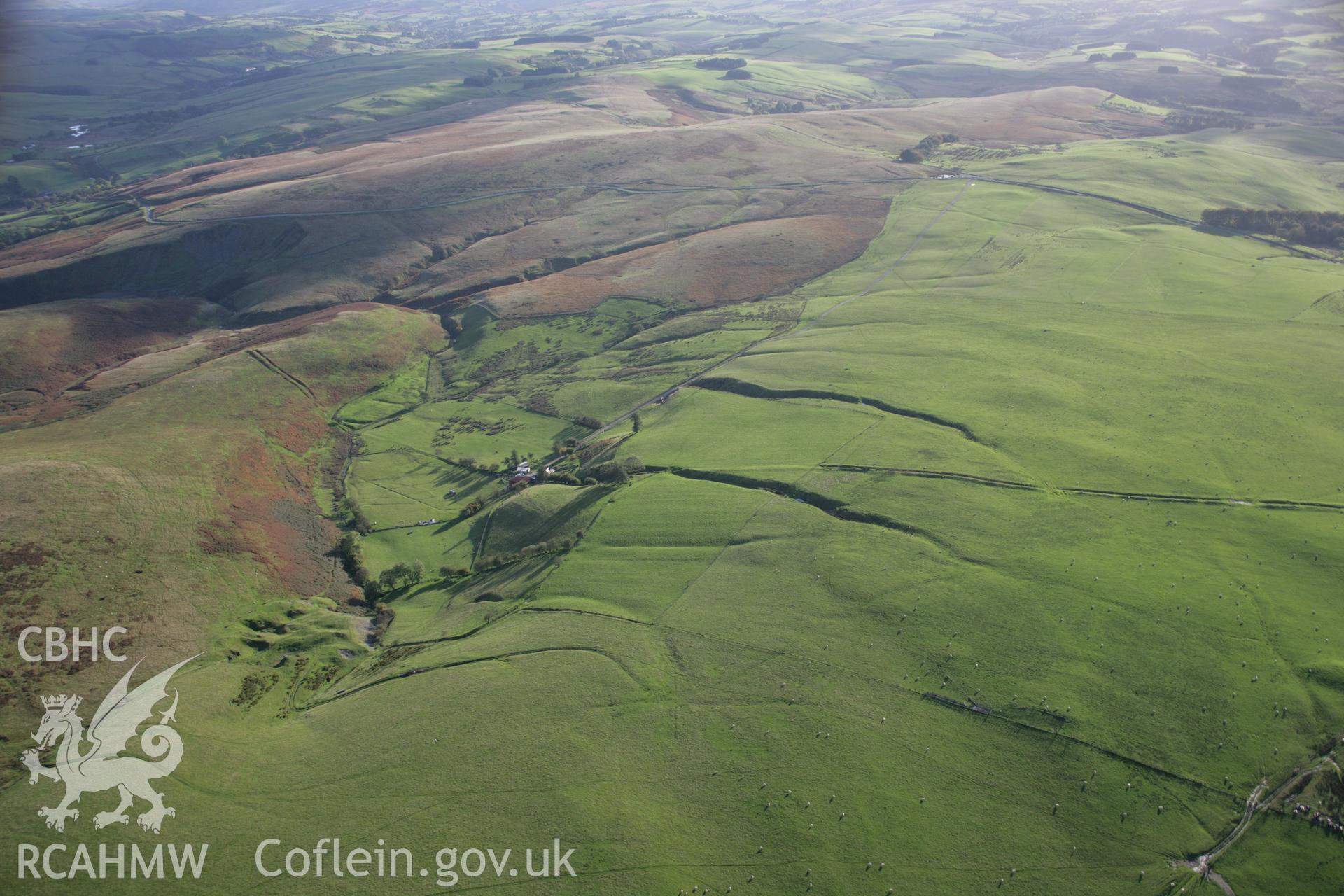 RCAHMW colour oblique aerial photograph of the central section of Two Tumps Dyke, from the north-east. Taken on 13 October 2005 by Toby Driver