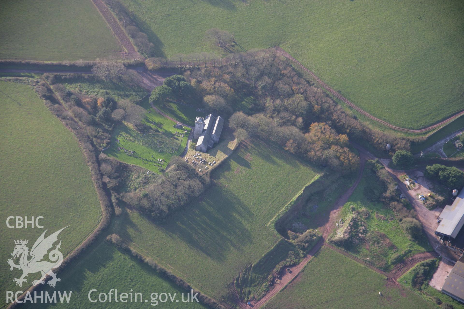 RCAHMW colour oblique aerial photograph of St Michael's Church, Castlemartin, from the north-east. Taken on 19 November 2005 by Toby Driver